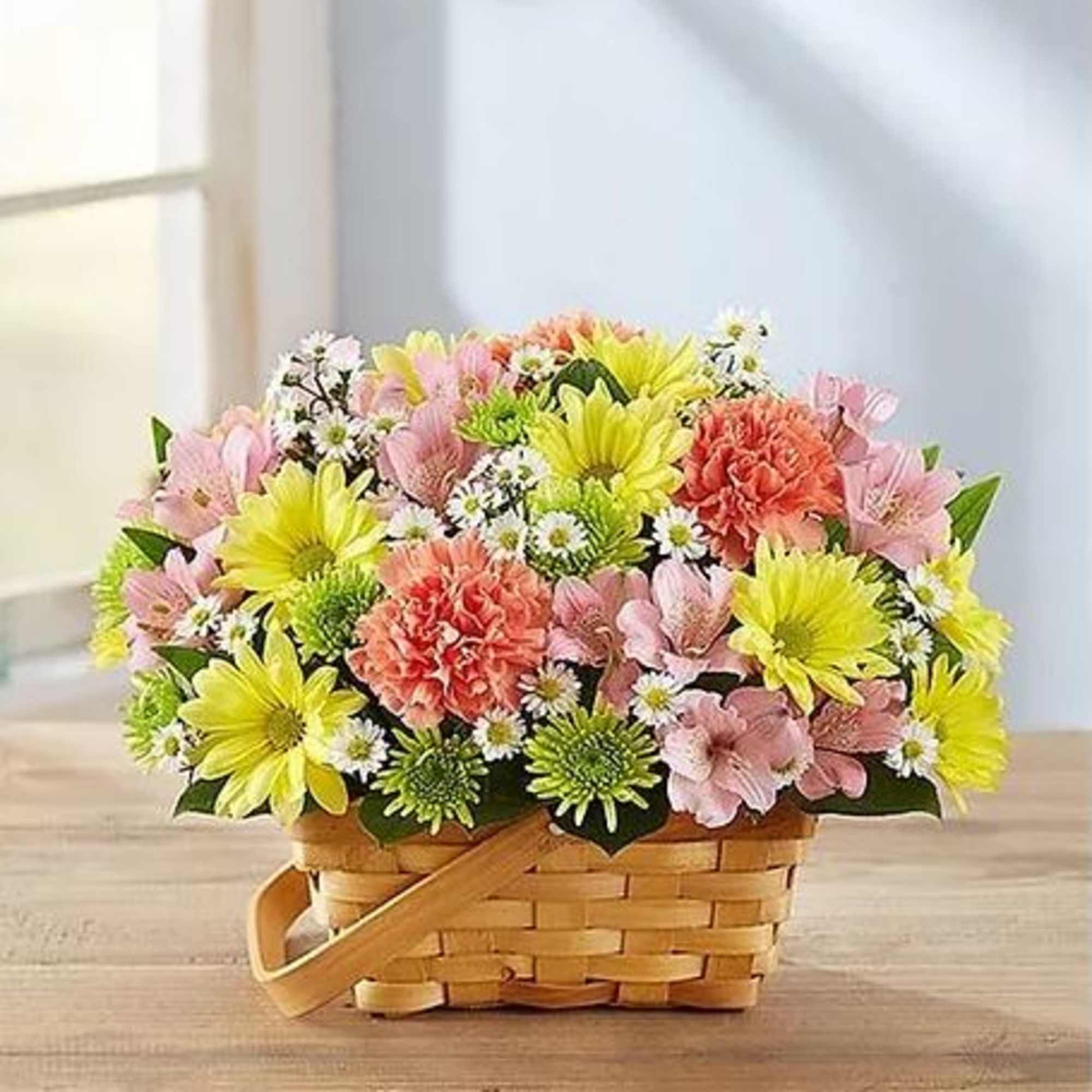 Our charming arrangement captures the simple beauty of fresh-picked flowers. A delightful