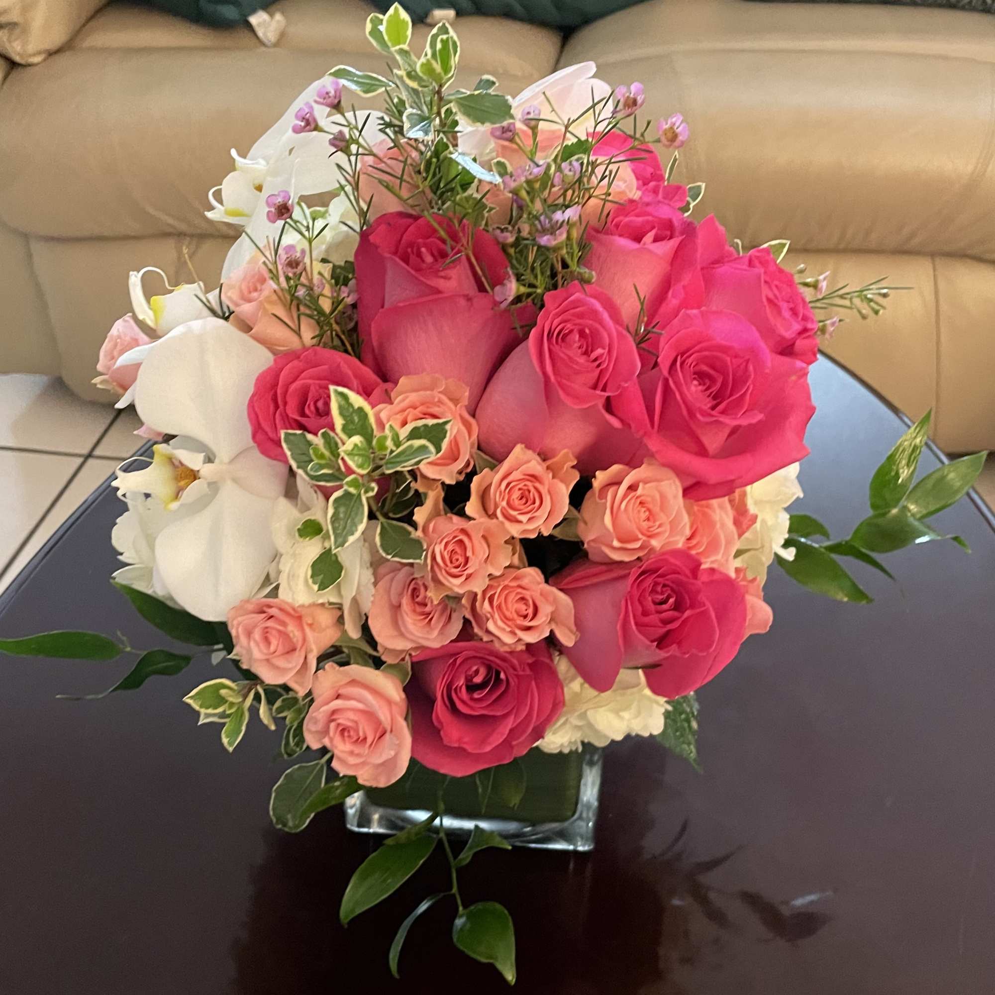 Classic and Beautiful, this large arrangement whispers luxury. Soft pinks, whites and