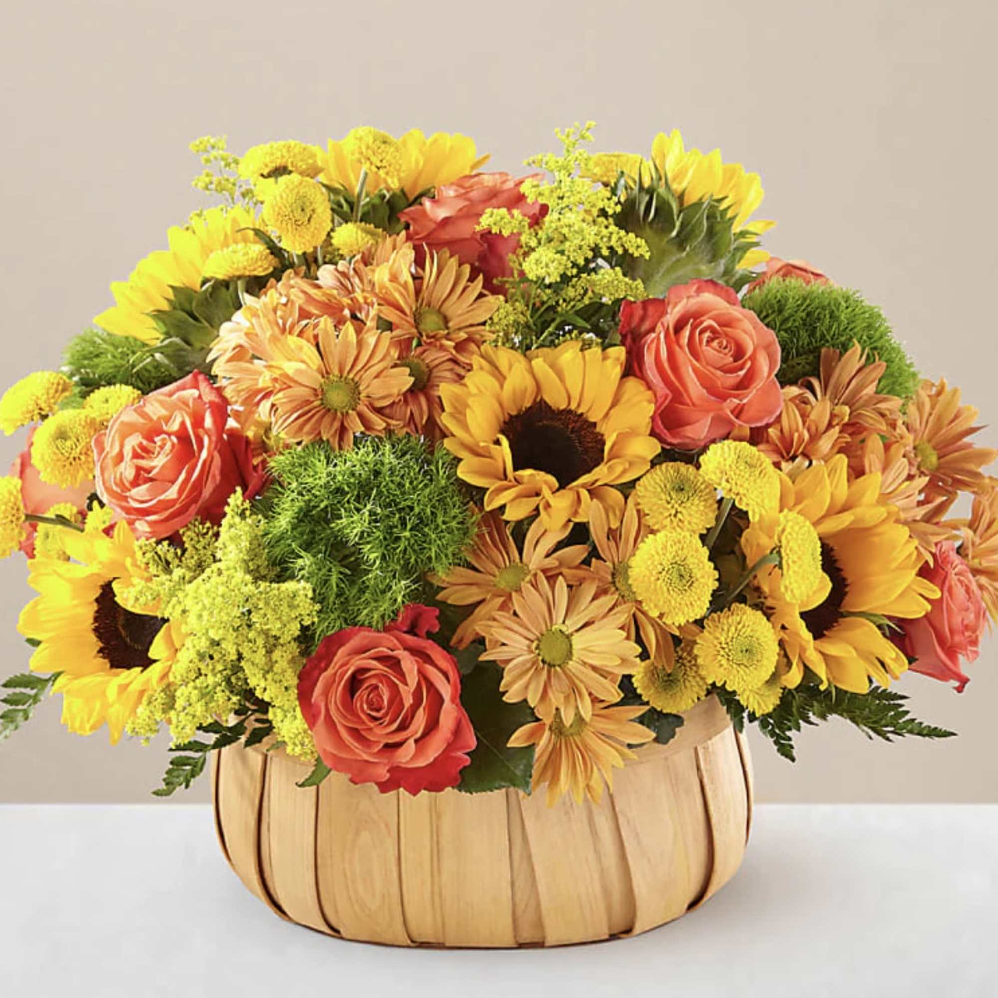 Rustic, natural beauty and vibrant shades on this basket by FTD