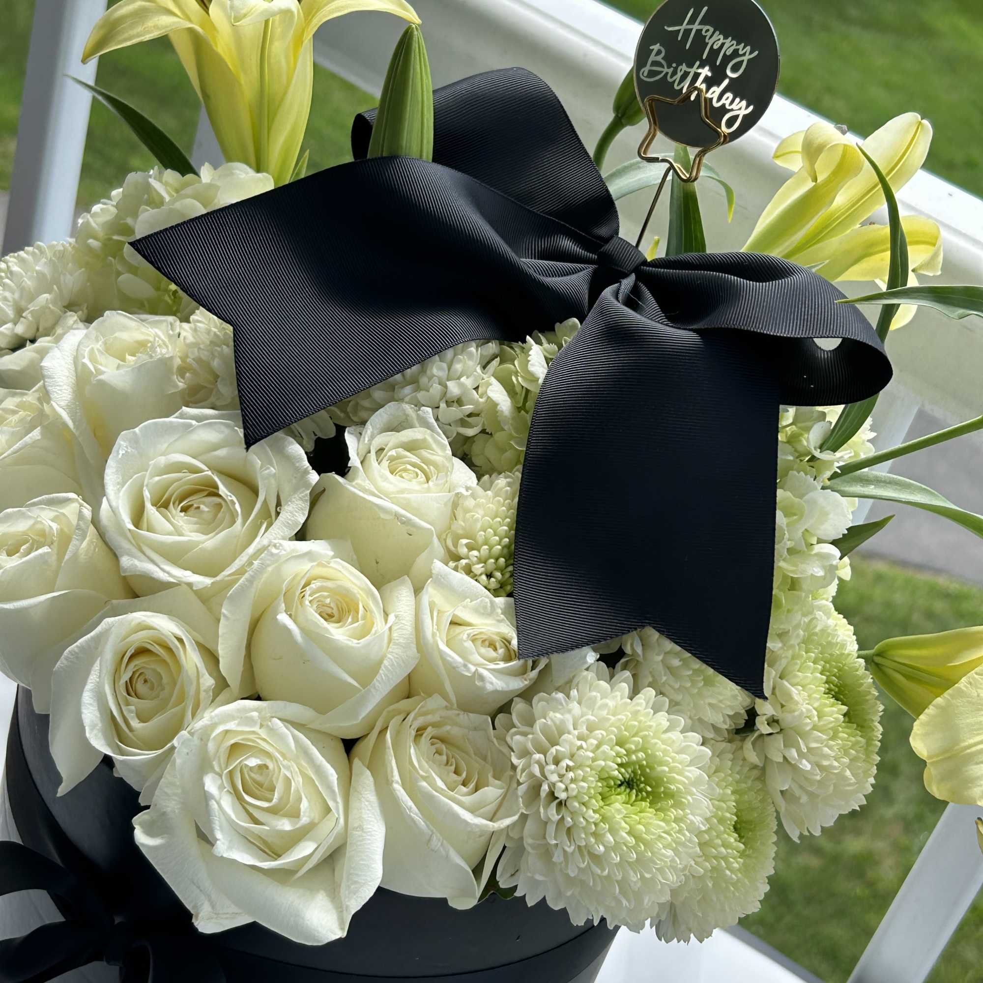 Make a bold statement with this elegantly simple design. white roses symbolize