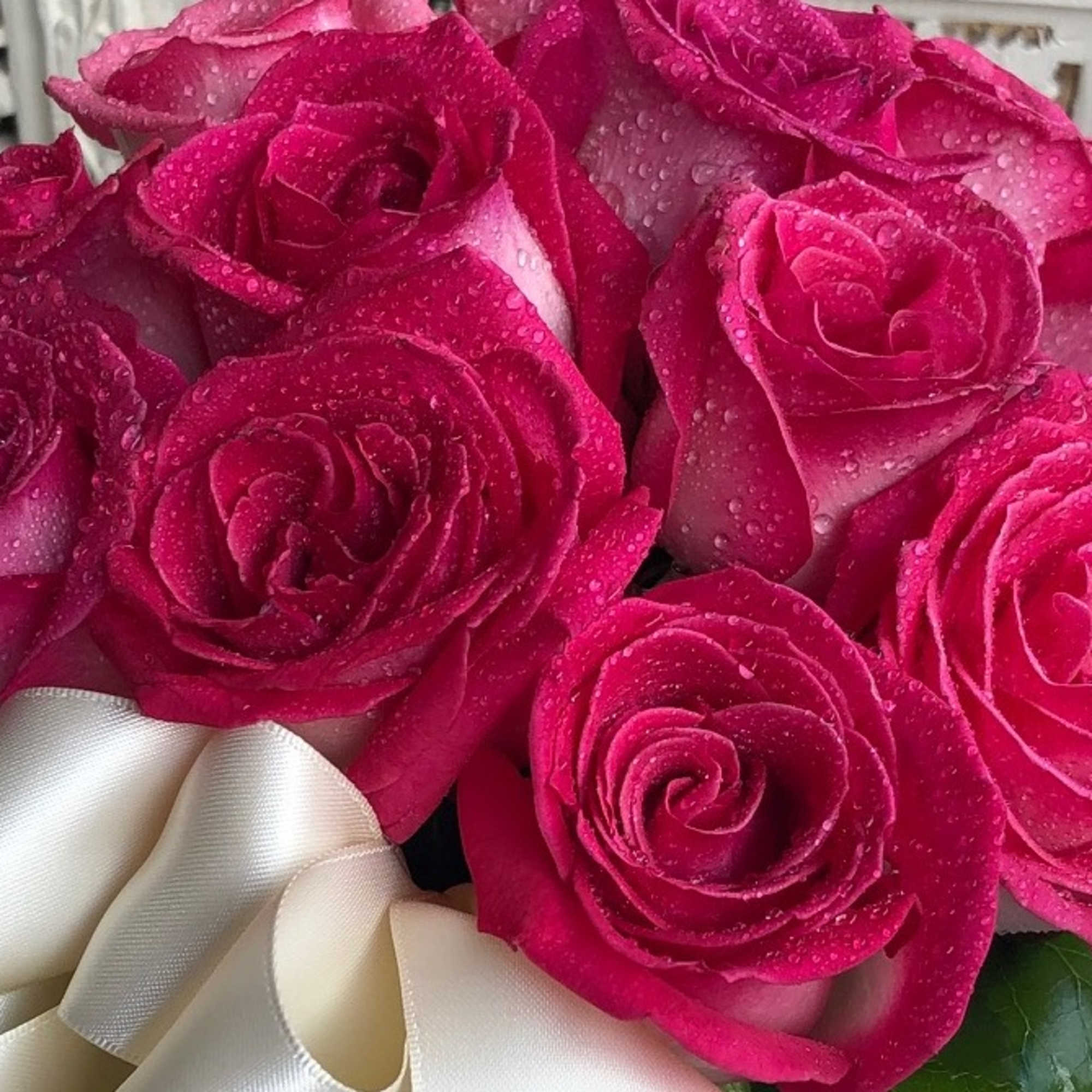 Gorgeous pink roses presented in a gold and white box and simply