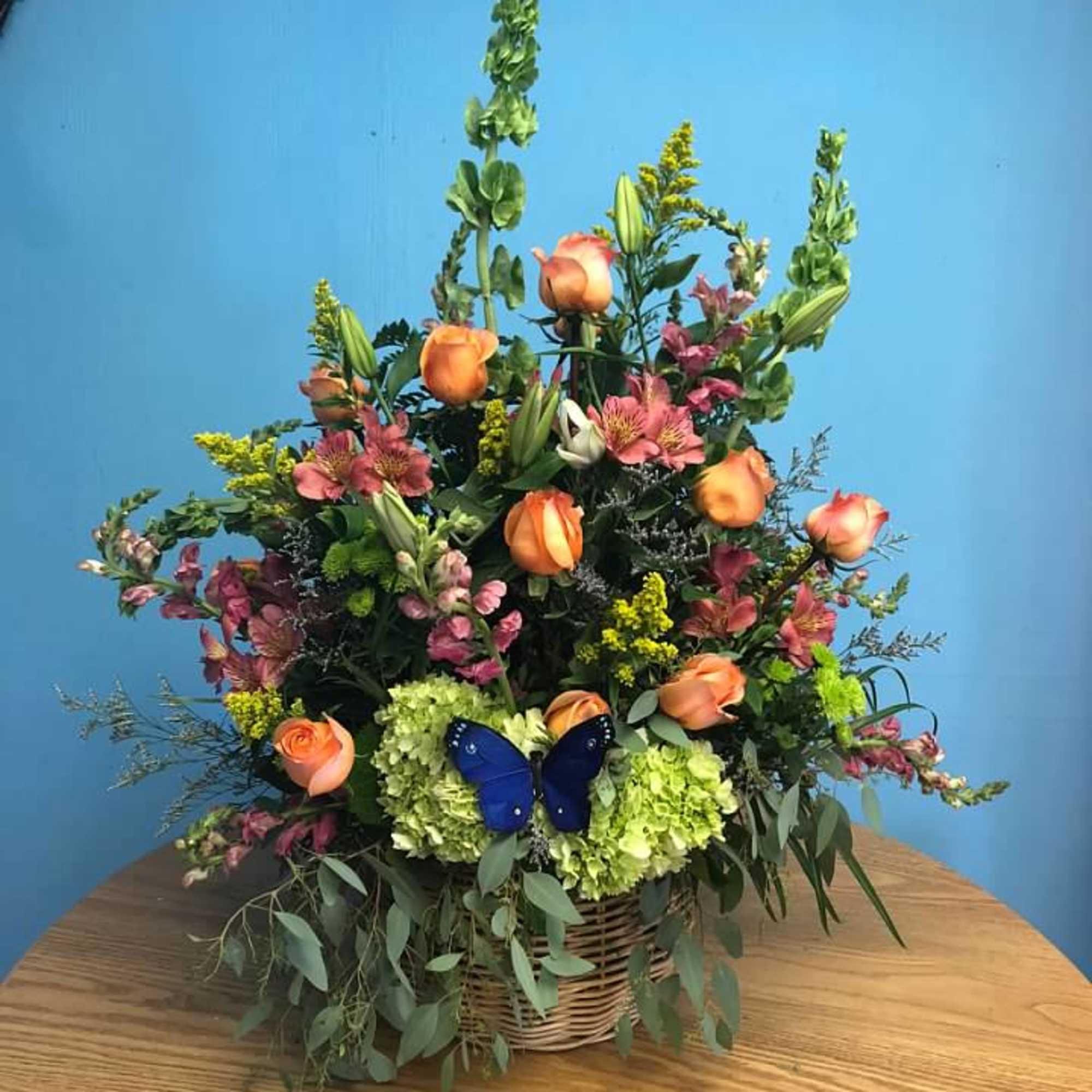 Designer's Choice - Rich and Vibrant Farewell
Bright bold flowers to represent your