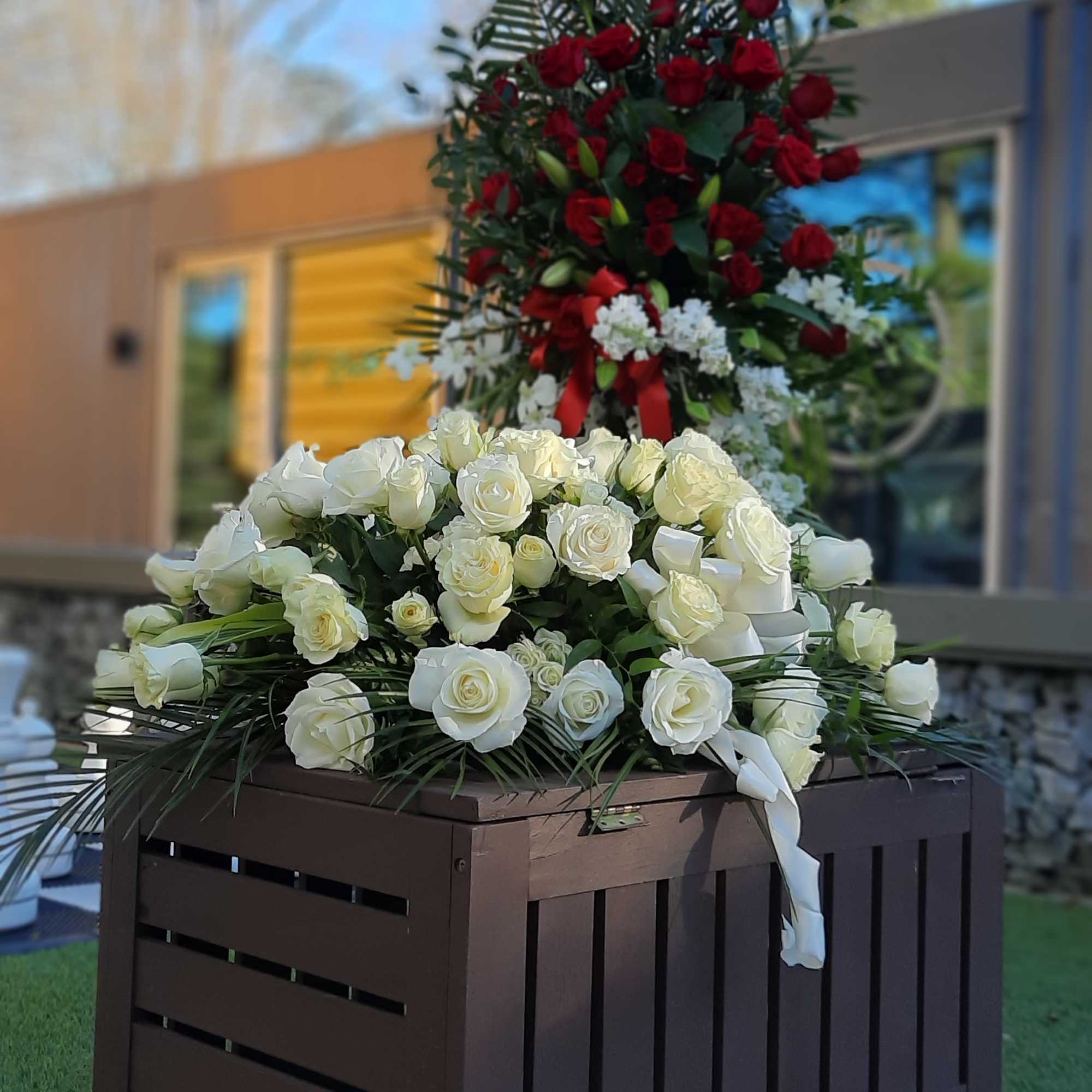 Your choice of casket spray and standing spray. A custom design or Your choice of casket spray and standing spray. A custom design or