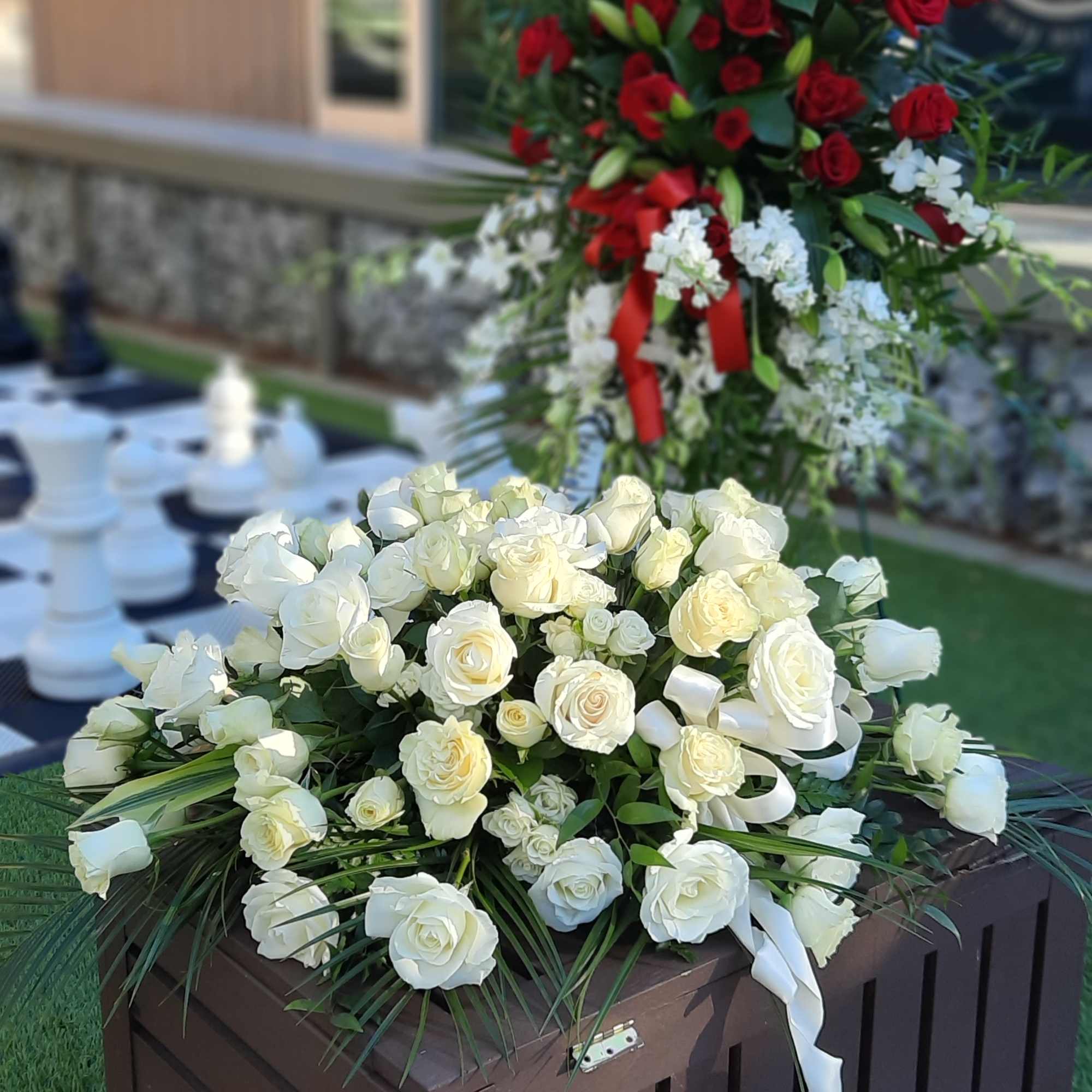 Your choice of casket spray and standing spray. A custom design or Your choice of casket spray and standing spray. A custom design or