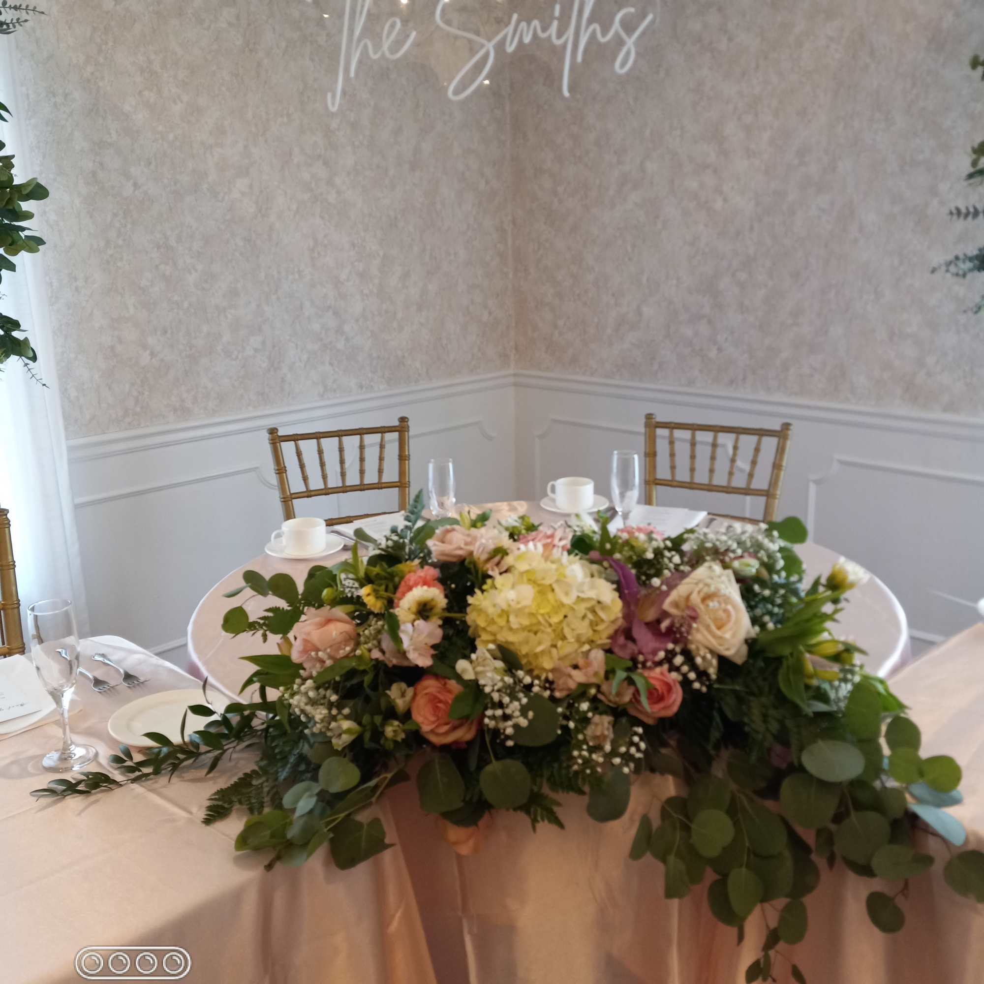 Beautiful pink and white flowers sweetheart table accent  centerpiece 