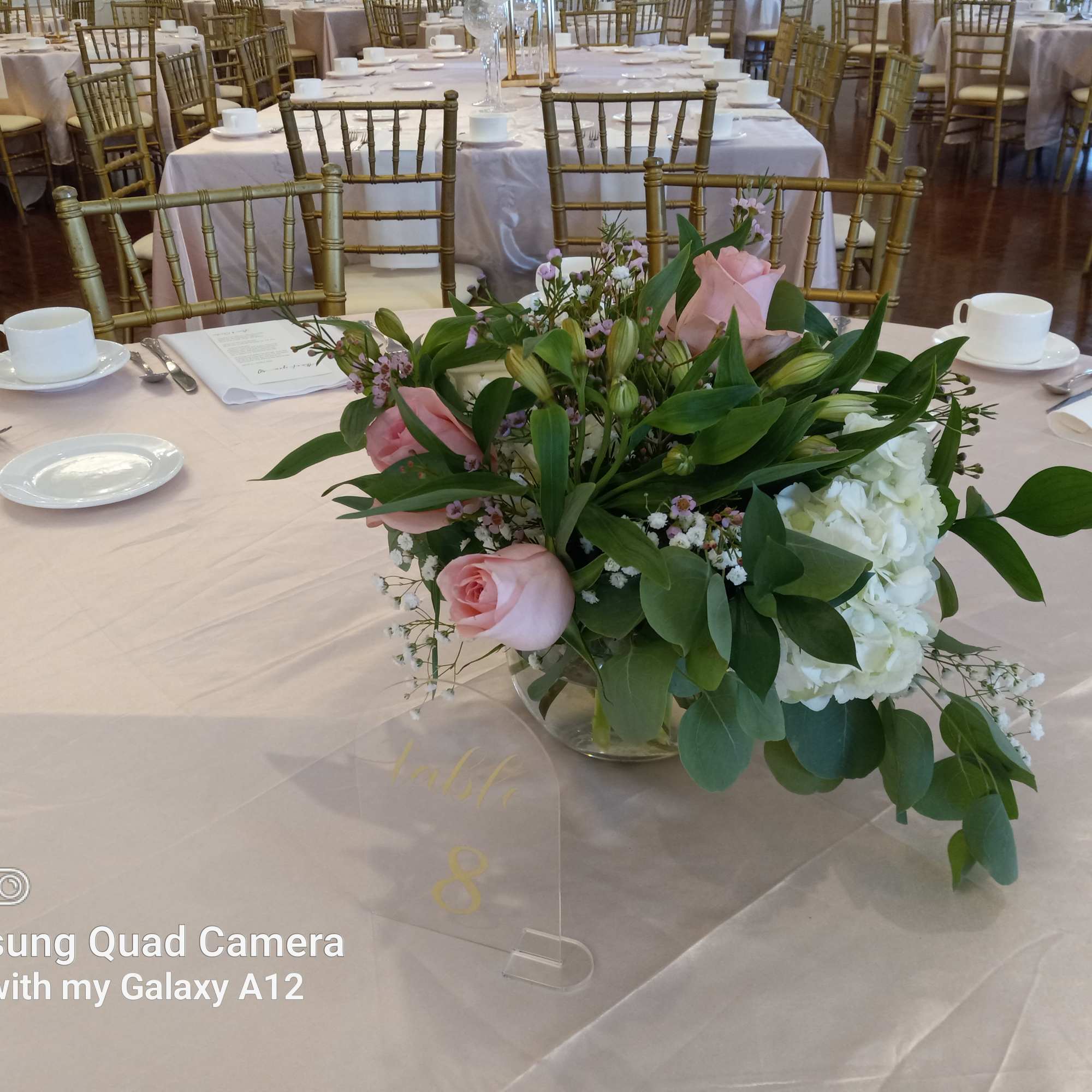 Nice and cheerful low table centerpieces for reception white lilies and pink