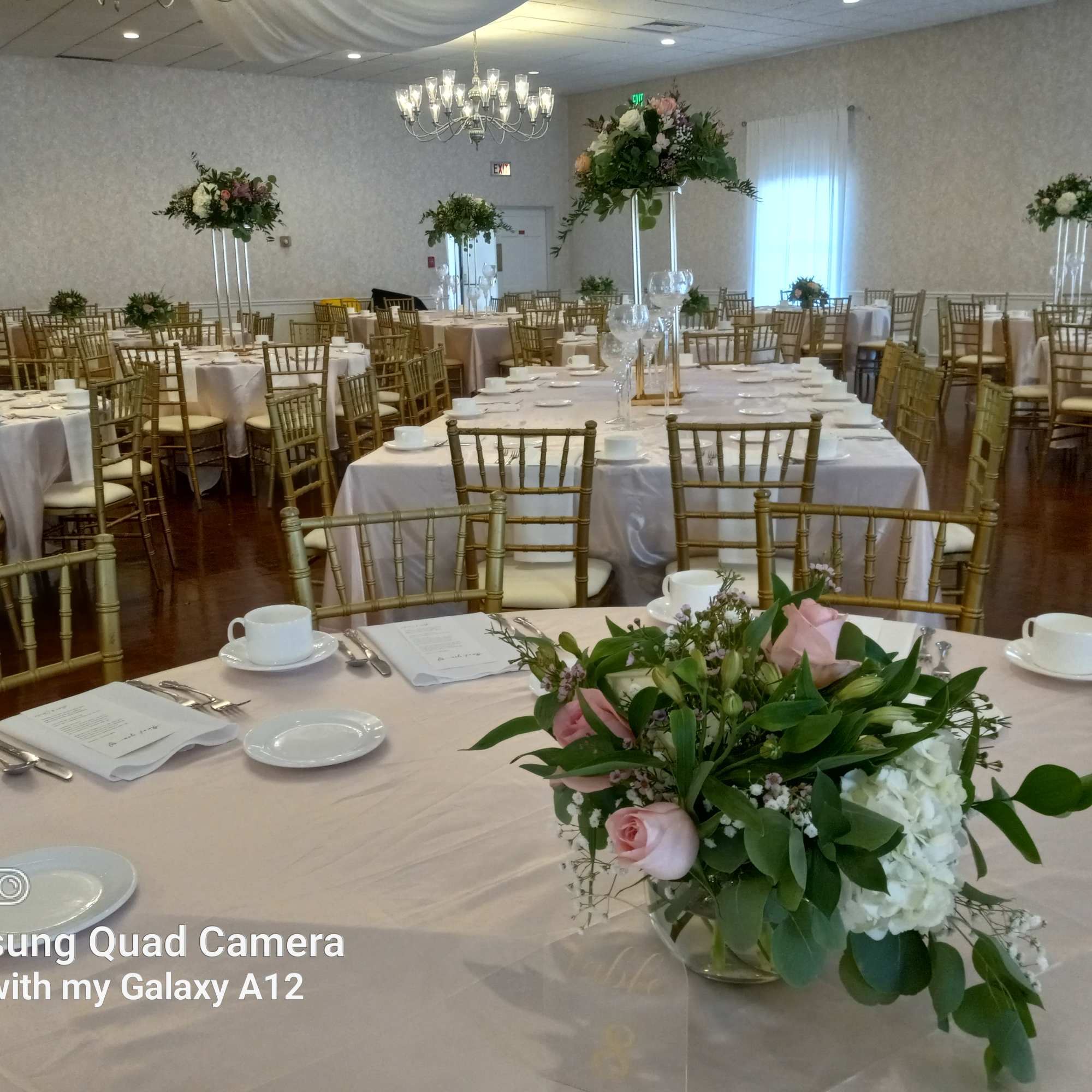 Nice and cheerful low table centerpieces for reception white lilies and pink