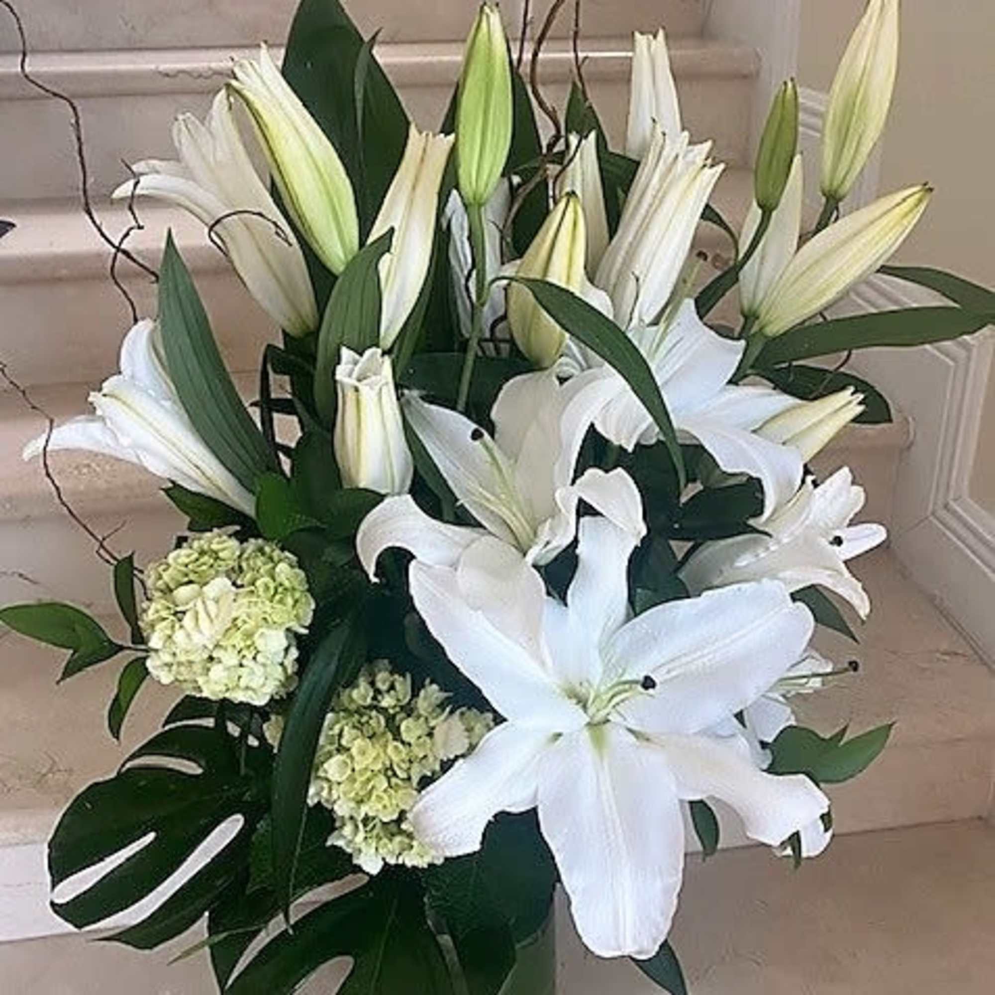 White Lilies arranged in a vase