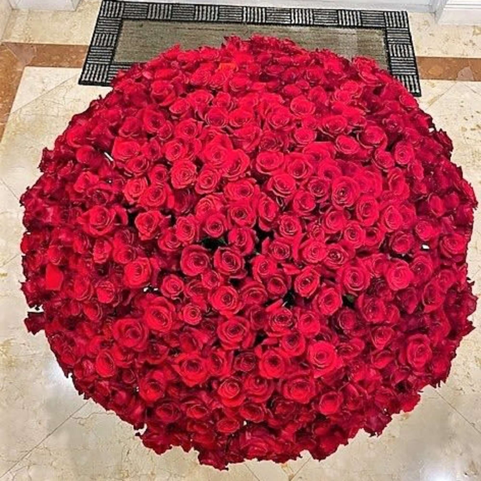 500 Long Stem Red Roses arranged in Container