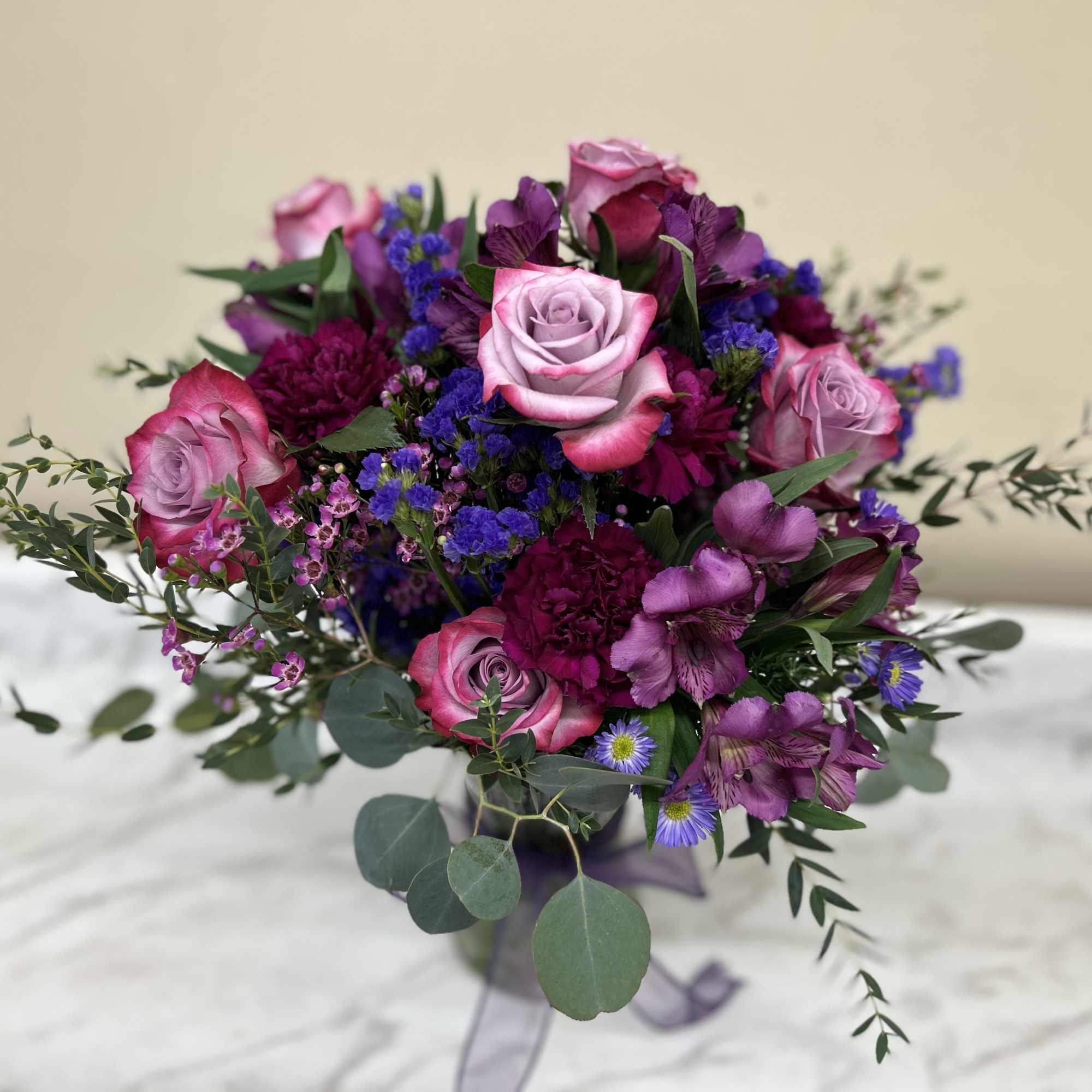 All mixed shades of purples in a vase