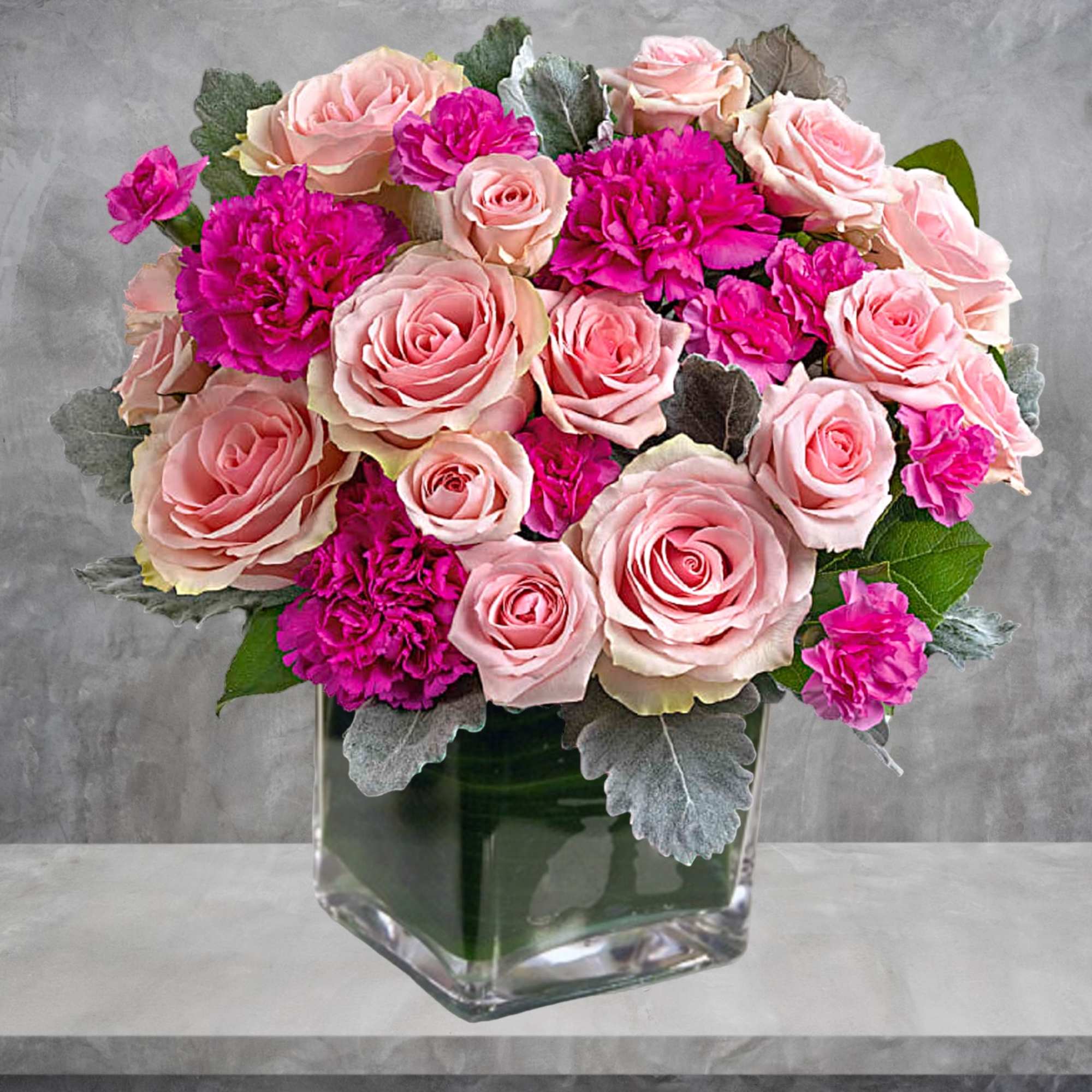Talk about a pink-me-up! Brighten anyone&#039;s day with this cheerful rose arrangement.

DETAILS
This