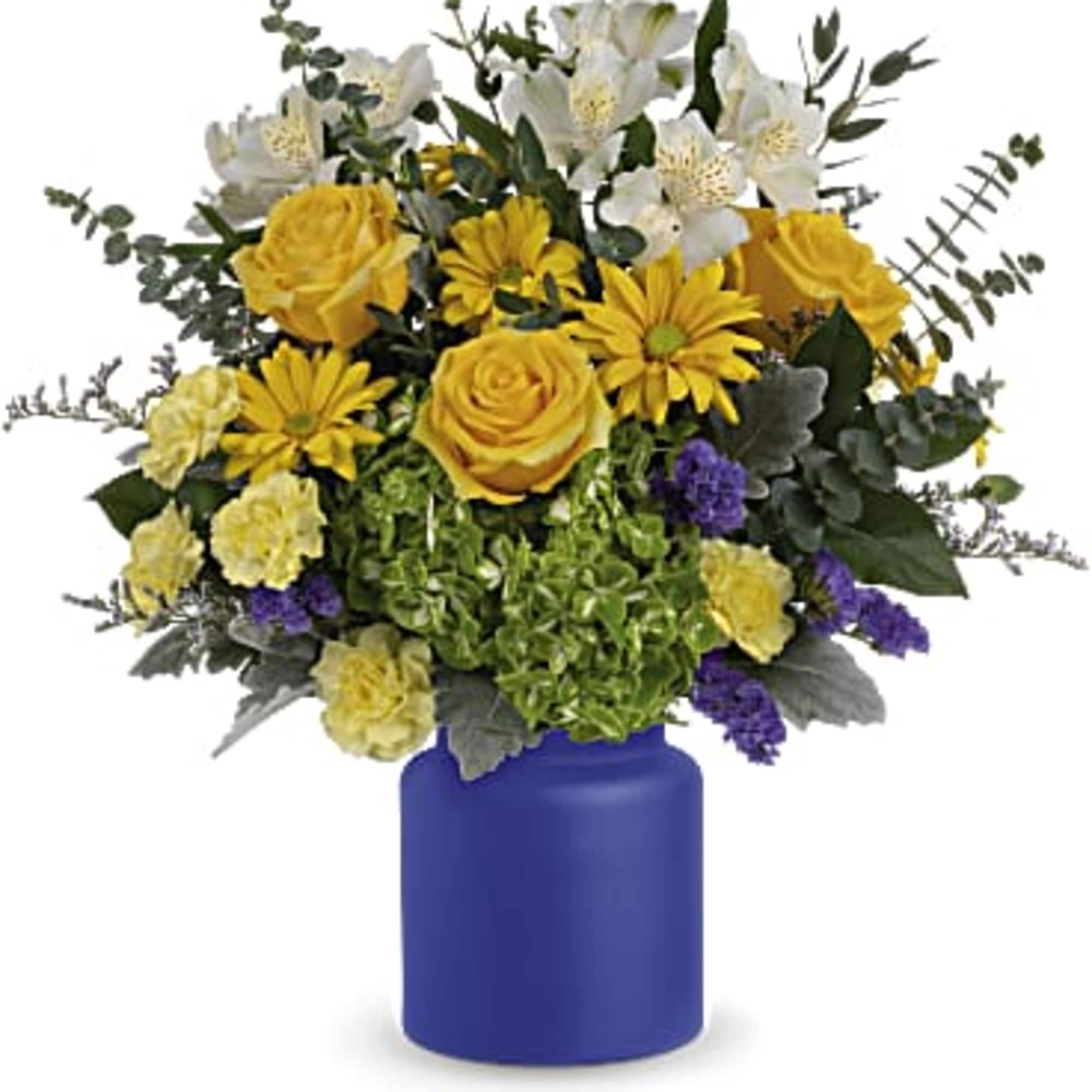 This bouquet features green hydrangea, yellow daisy spray chrysanthemums, white alstroemeria, purple