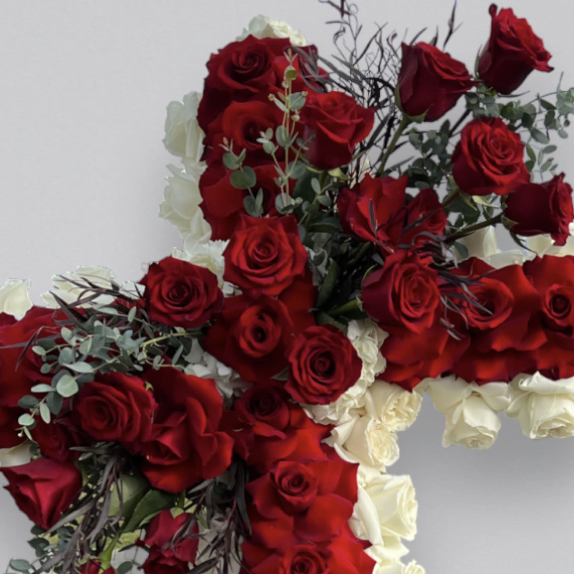 Invite beauty to your love ones with elegant funeral arrangement, presented in