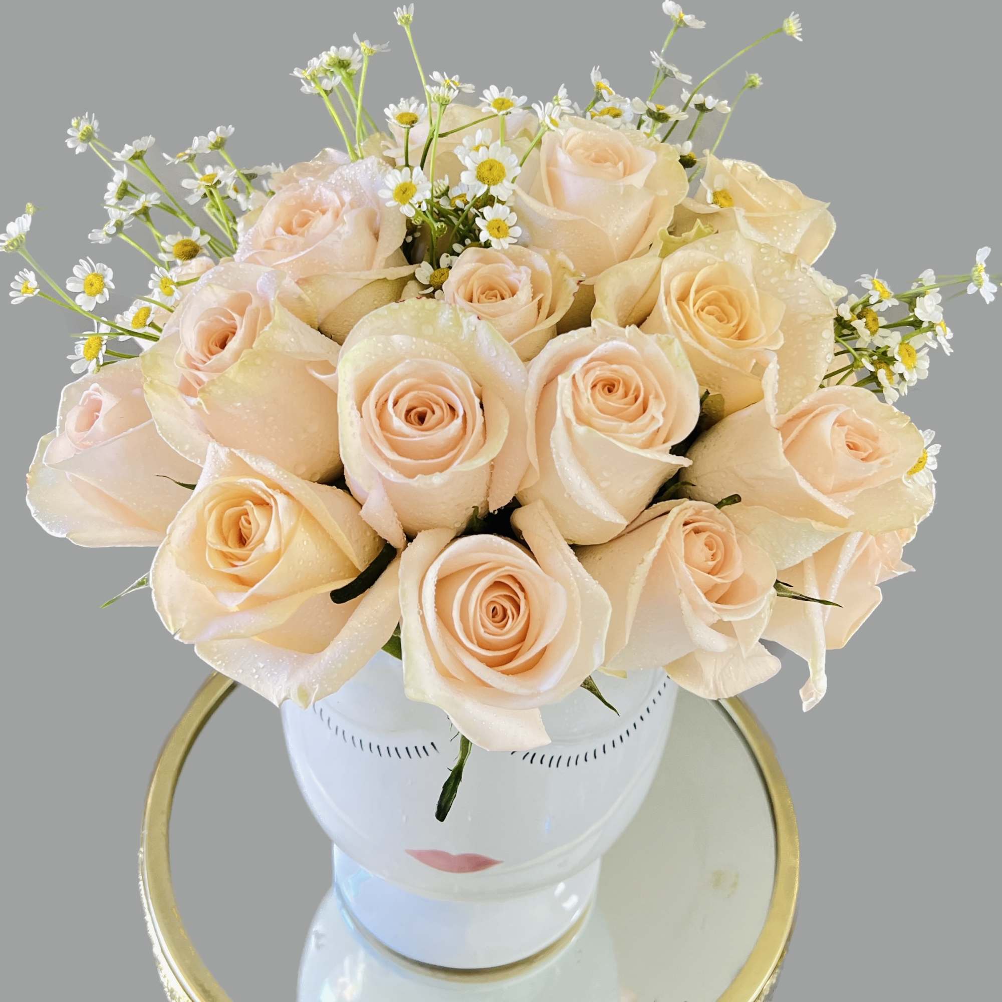 Brighten someone&#039;s day with this cheerful bouquet. This arrangement includes peach colored