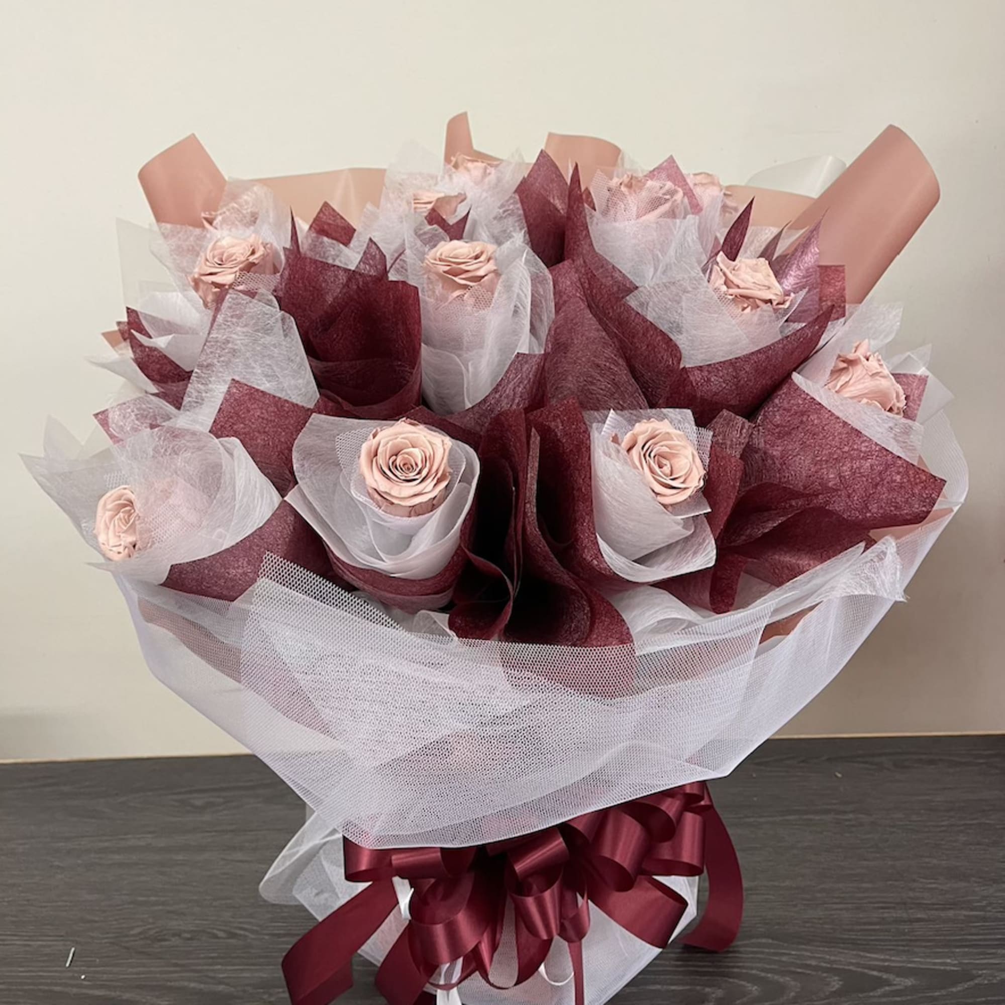 Roses Wrapped and Arranged in Vase.
Can be made in any color and
