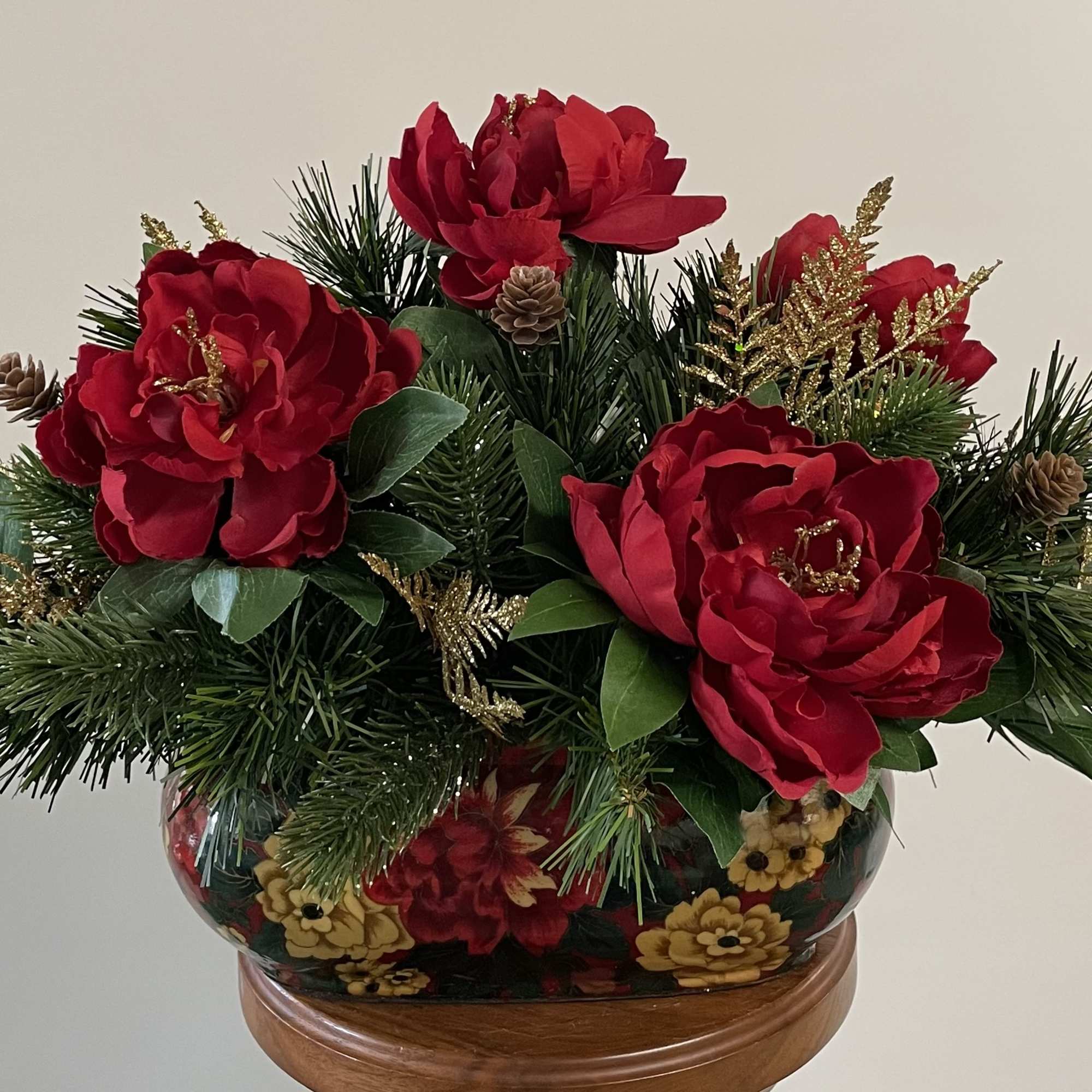 All-around silk arrangement in reds, greens, and gold.
22X13.5