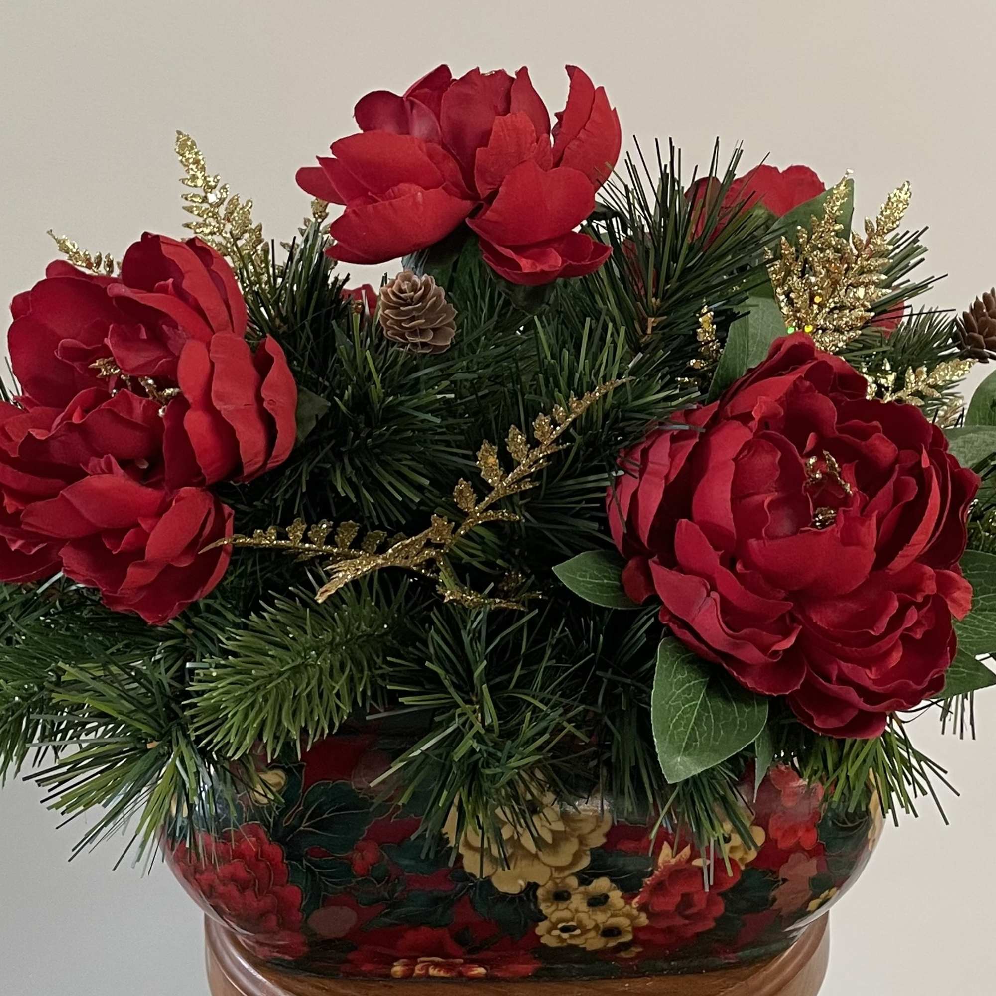 All-around silk arrangement in reds, greens, and gold.
22X13.5