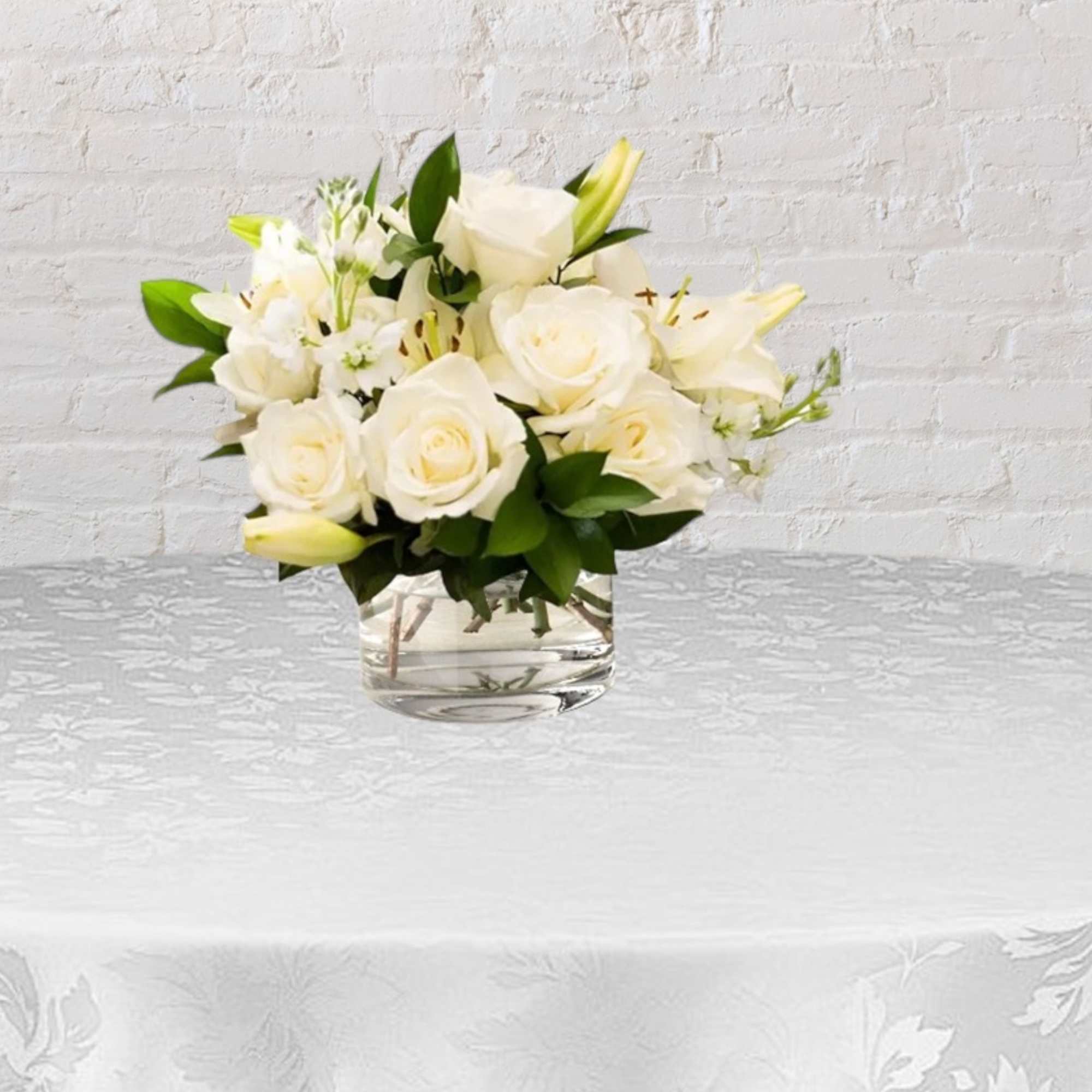 This set of white centerpieces comes with 23 fresh stems arranged in