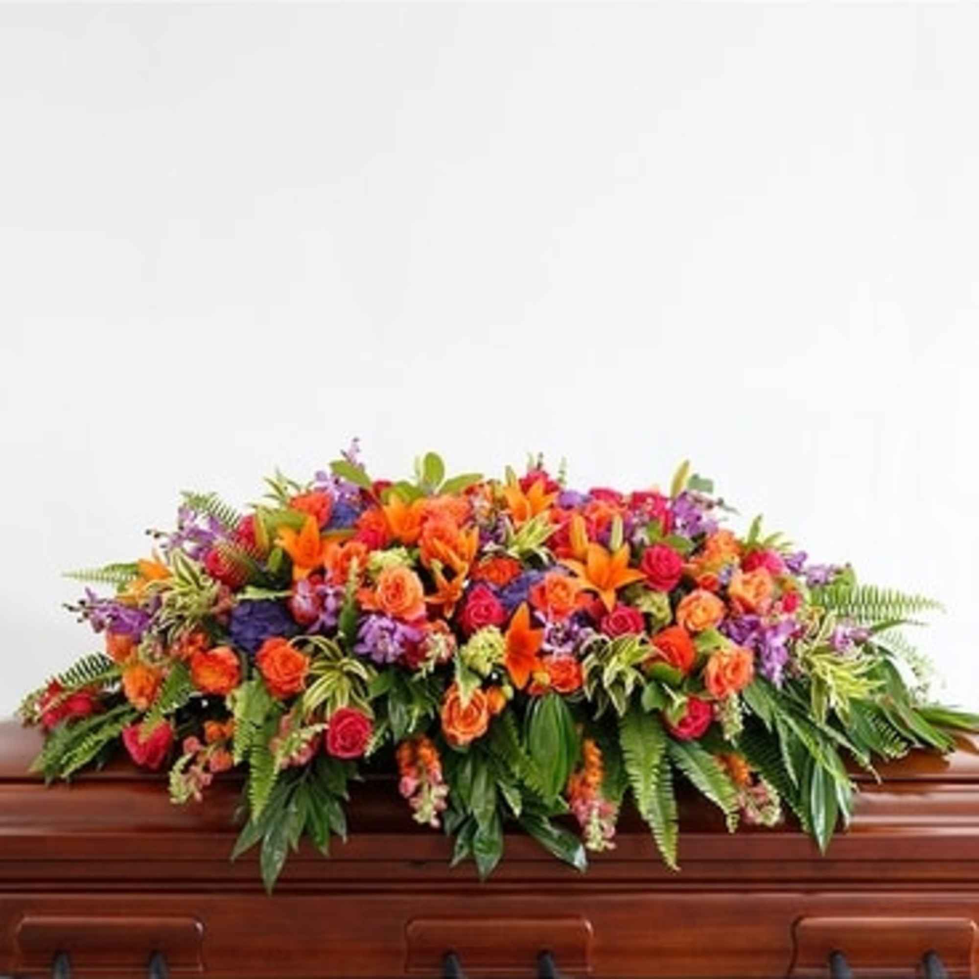 This incredible casket spray from the Bright Remembrance Collection is stunning with