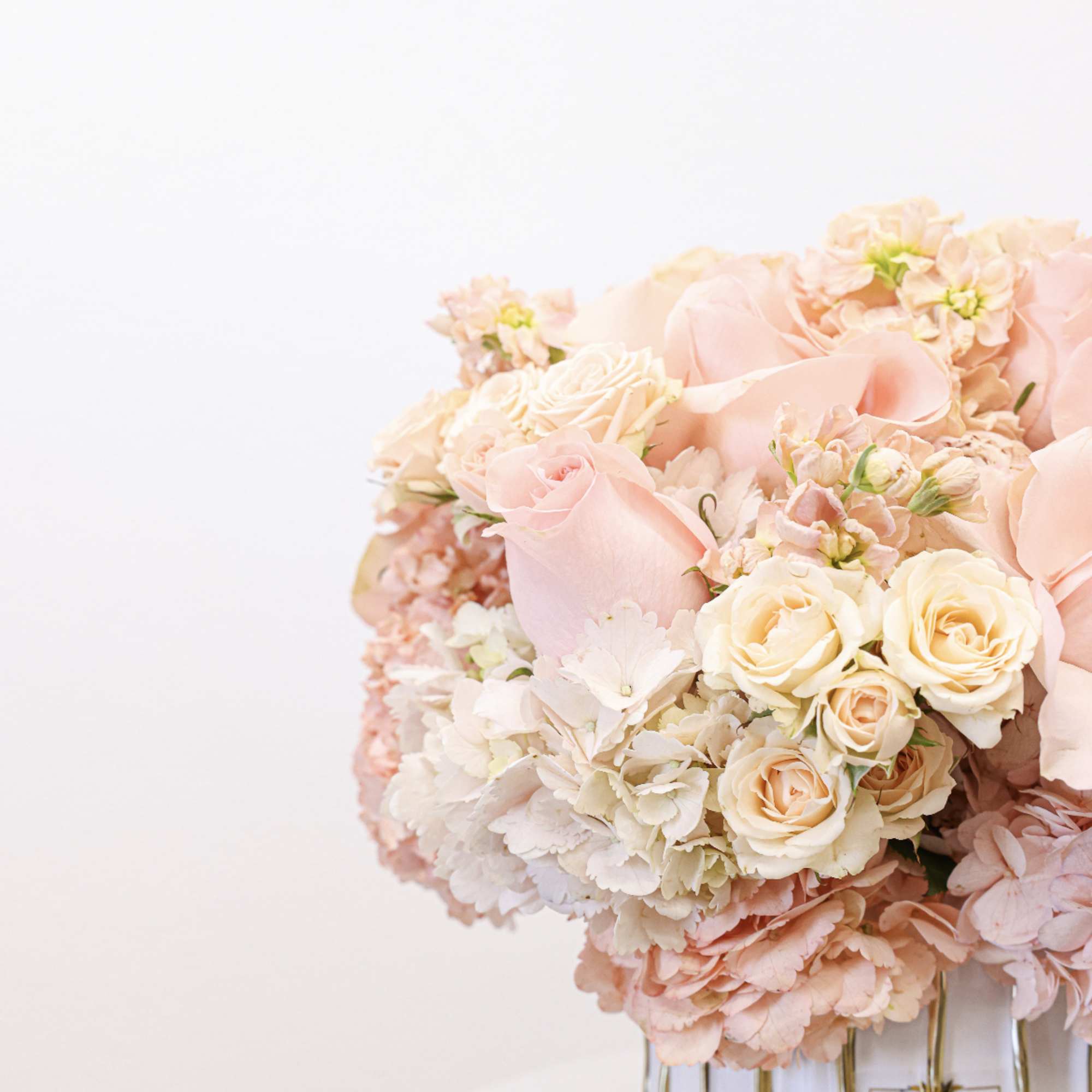 Bring beauty to the table with elegant arrangement, presented in a round