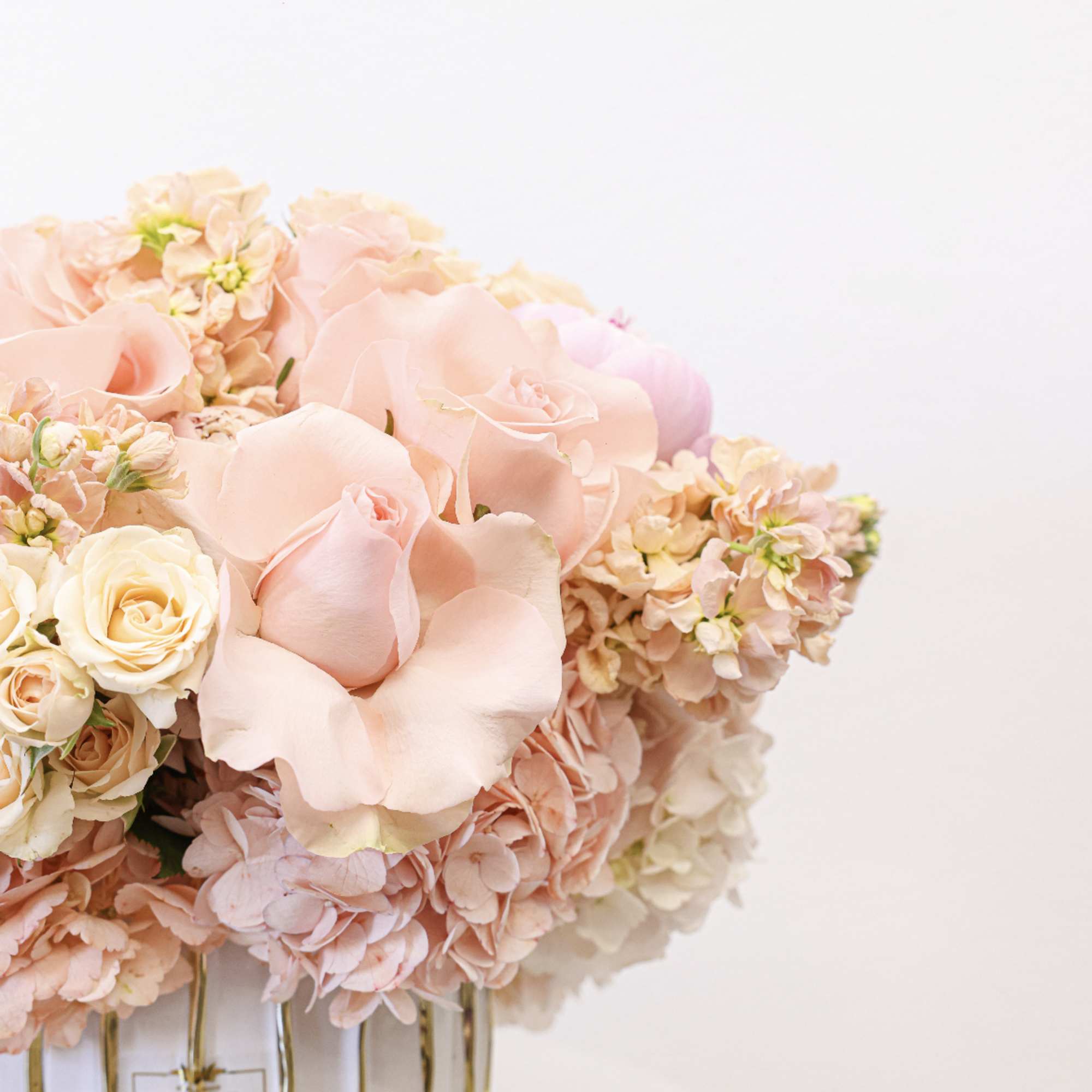 Bring beauty to the table with elegant arrangement, presented in a round