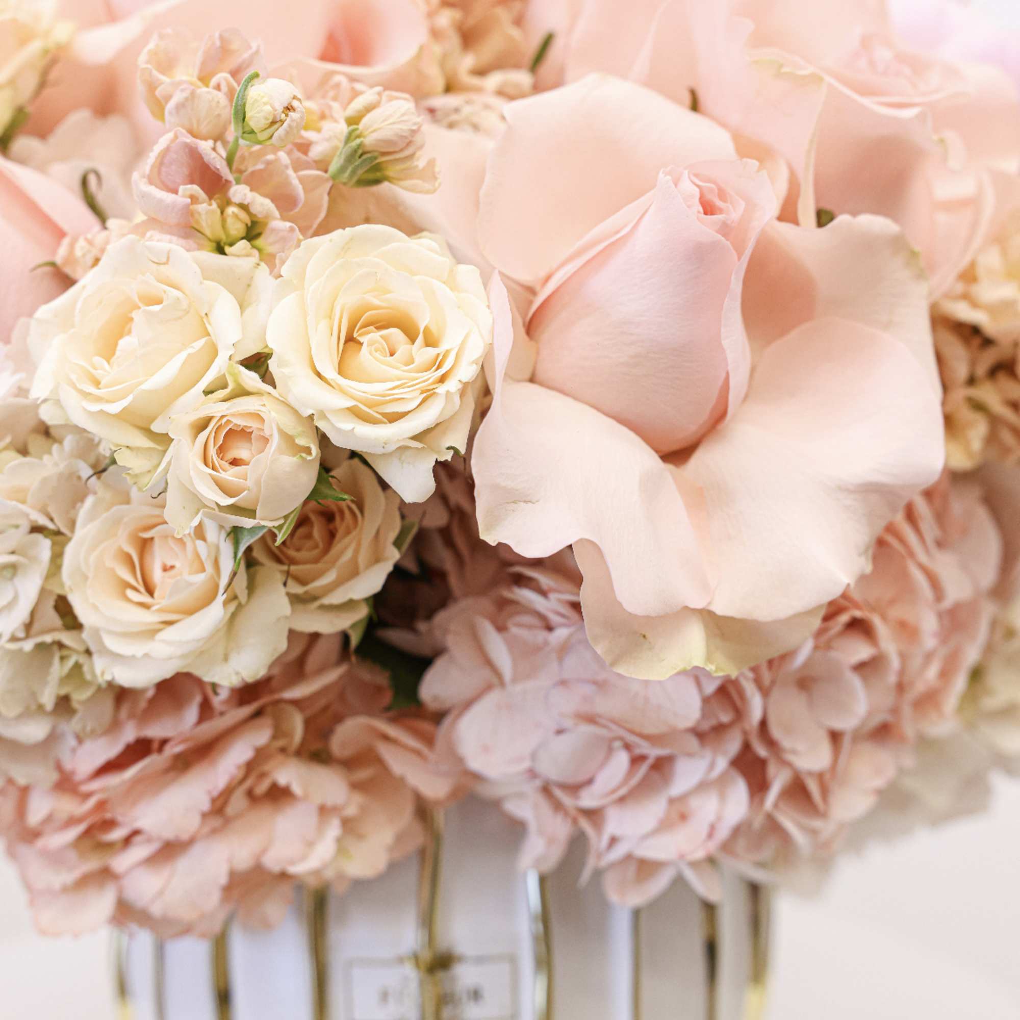 Bring beauty to the table with elegant arrangement, presented in a round