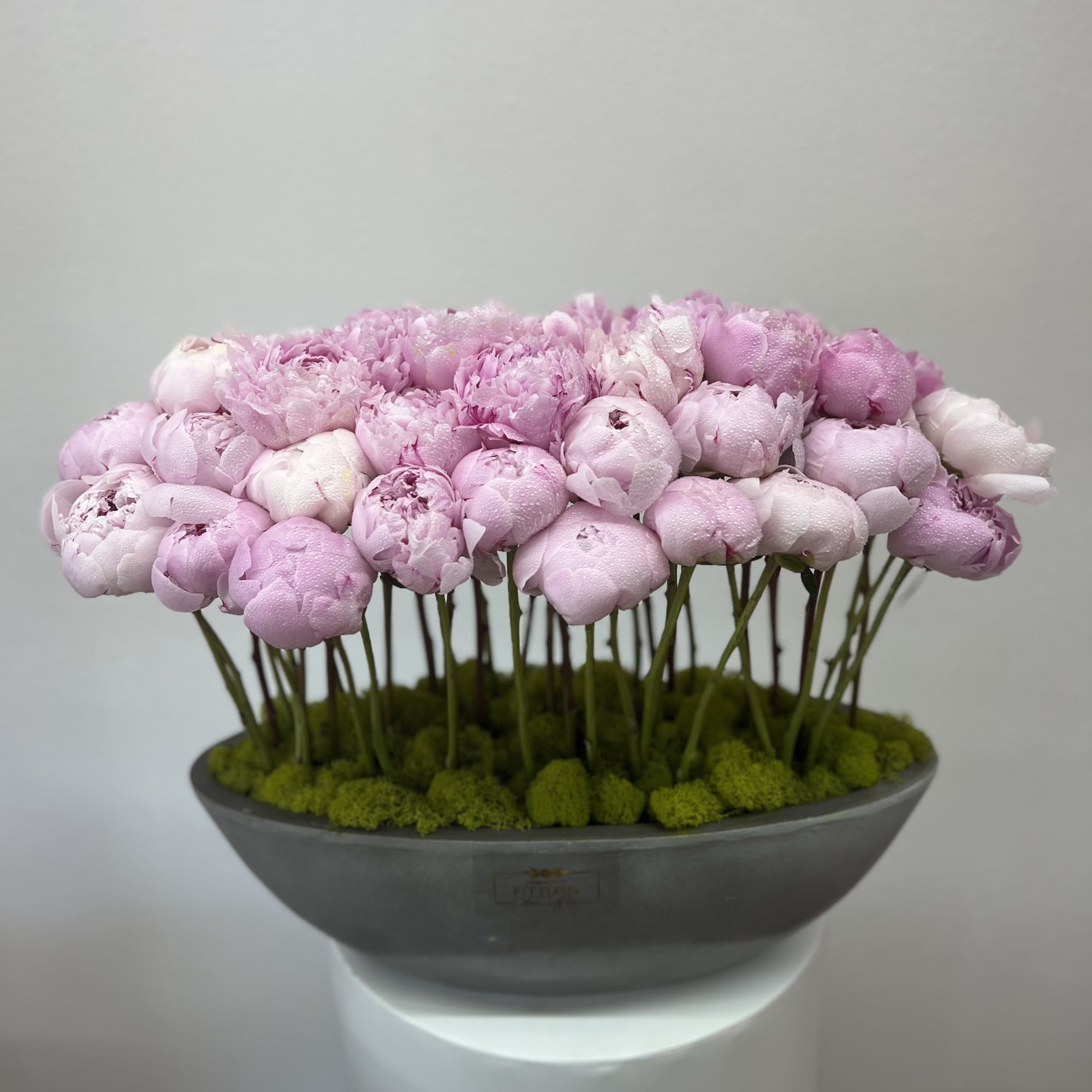 Bring beauty to the table with elegant arrangement, presented in a long