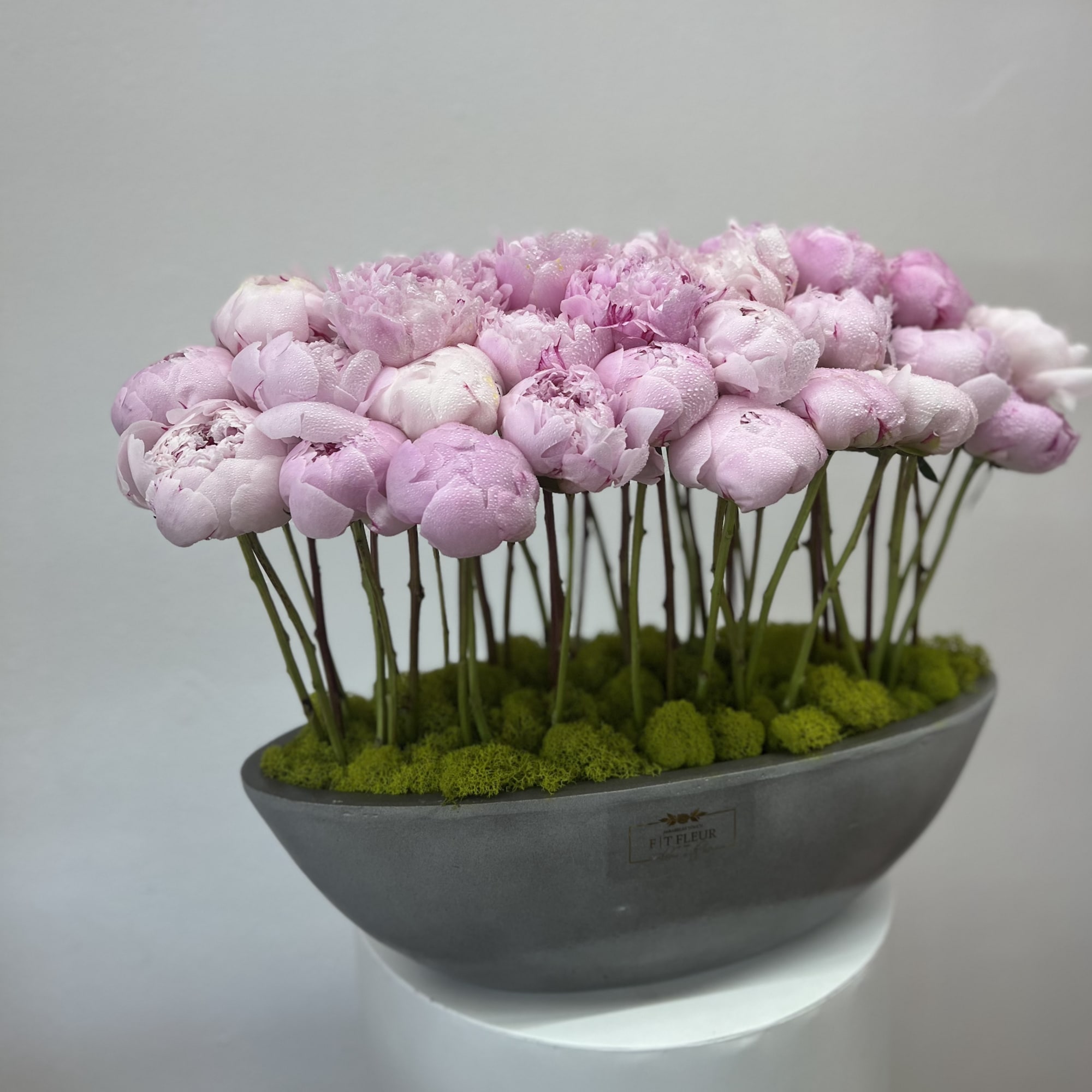 Bring beauty to the table with elegant arrangement, presented in a long