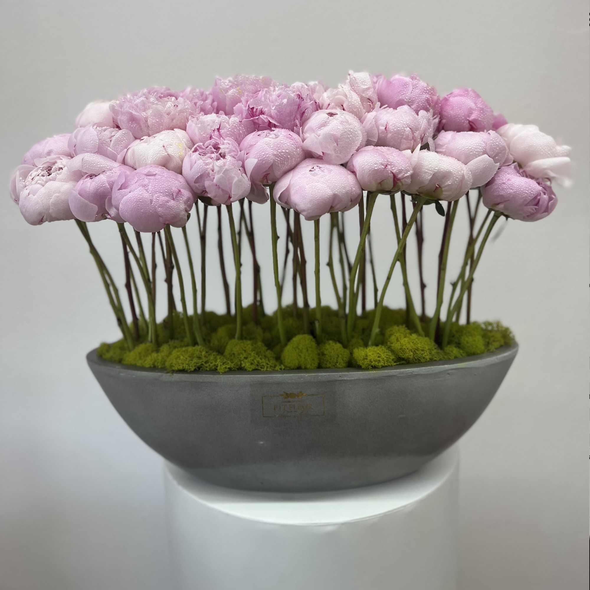 Bring beauty to the table with elegant arrangement, presented in a long