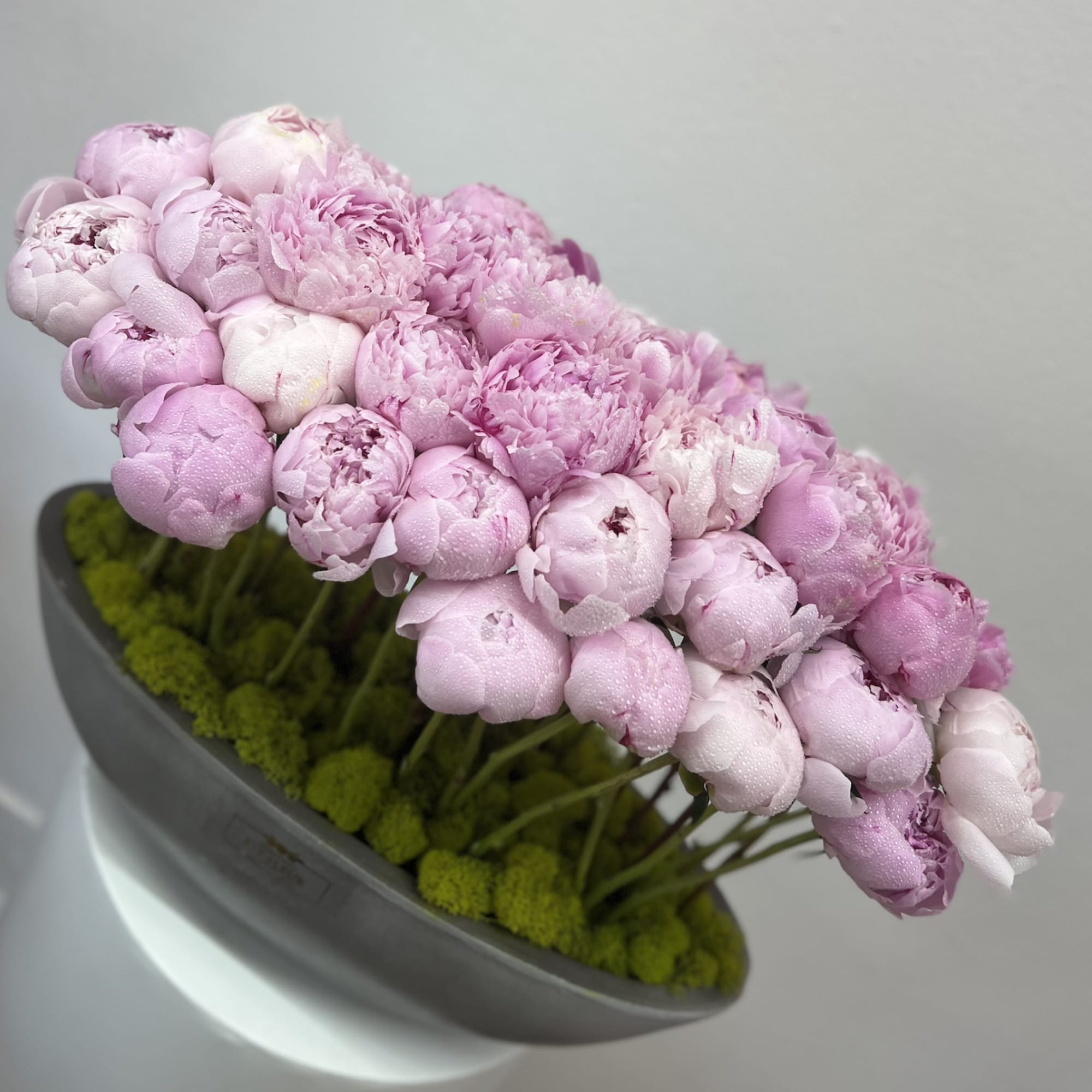 Bring beauty to the table with elegant arrangement, presented in a long