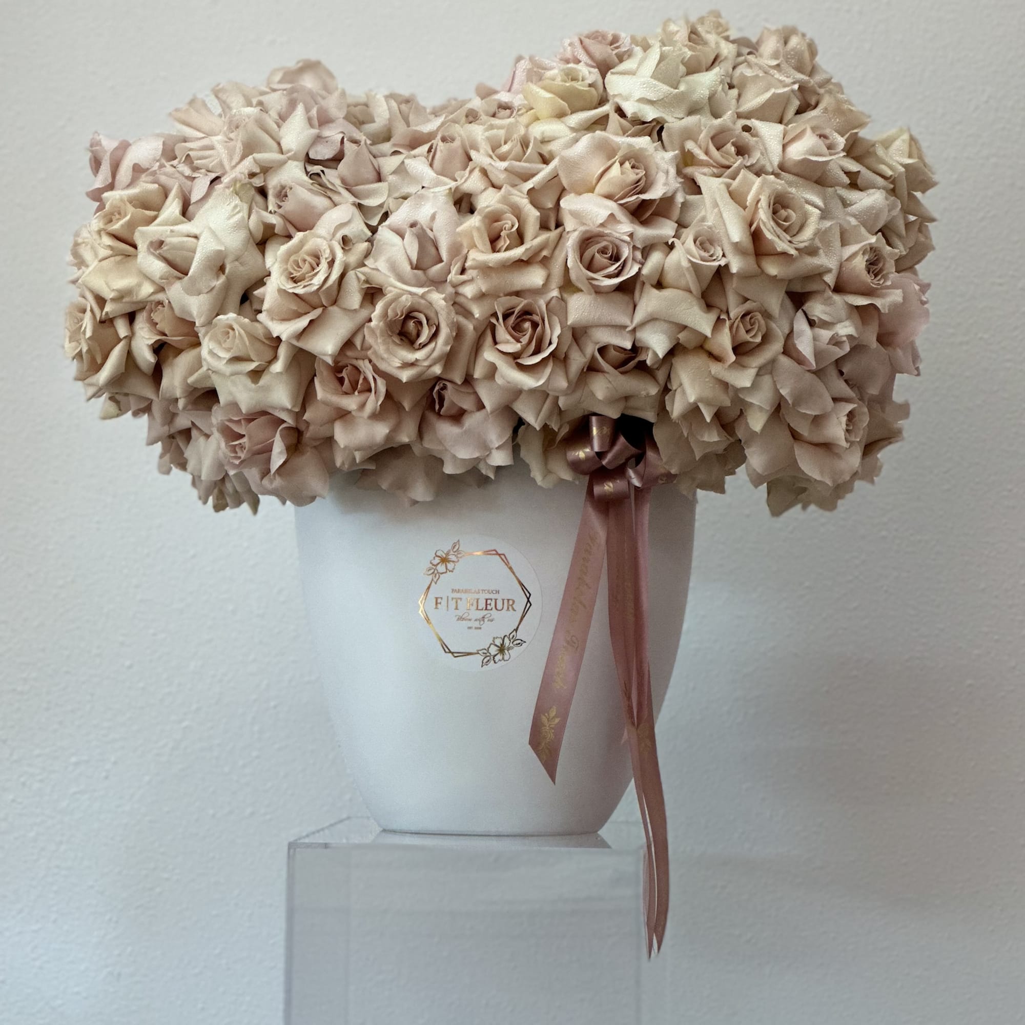 Bring beauty to the table with elegant arrangement, presented in a tall