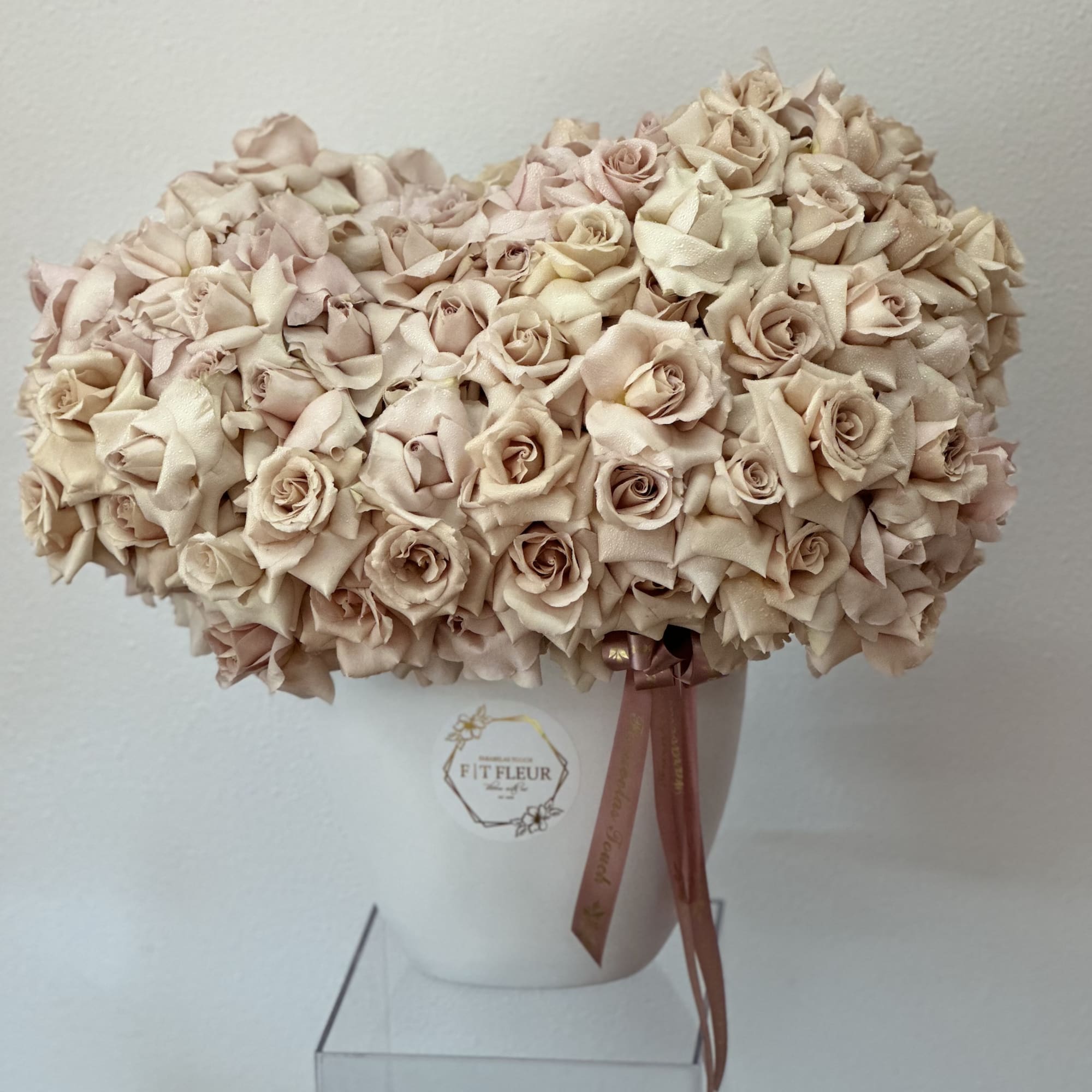 Bring beauty to the table with elegant arrangement, presented in a tall