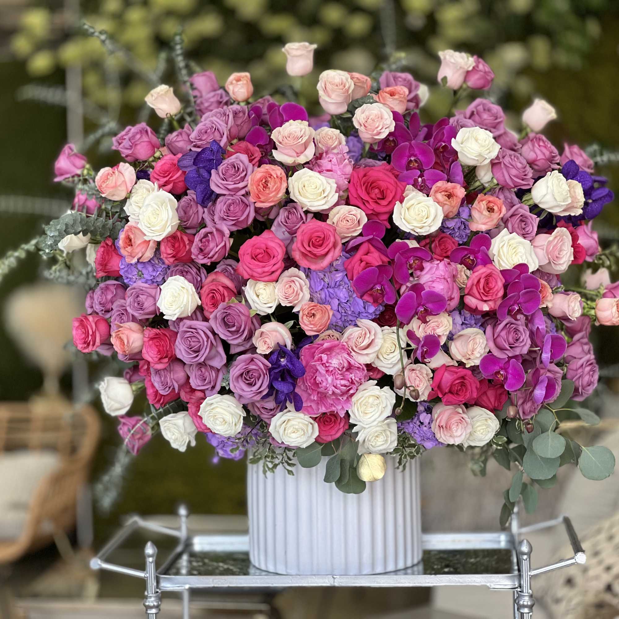  Mix Roses in a custom vase.

