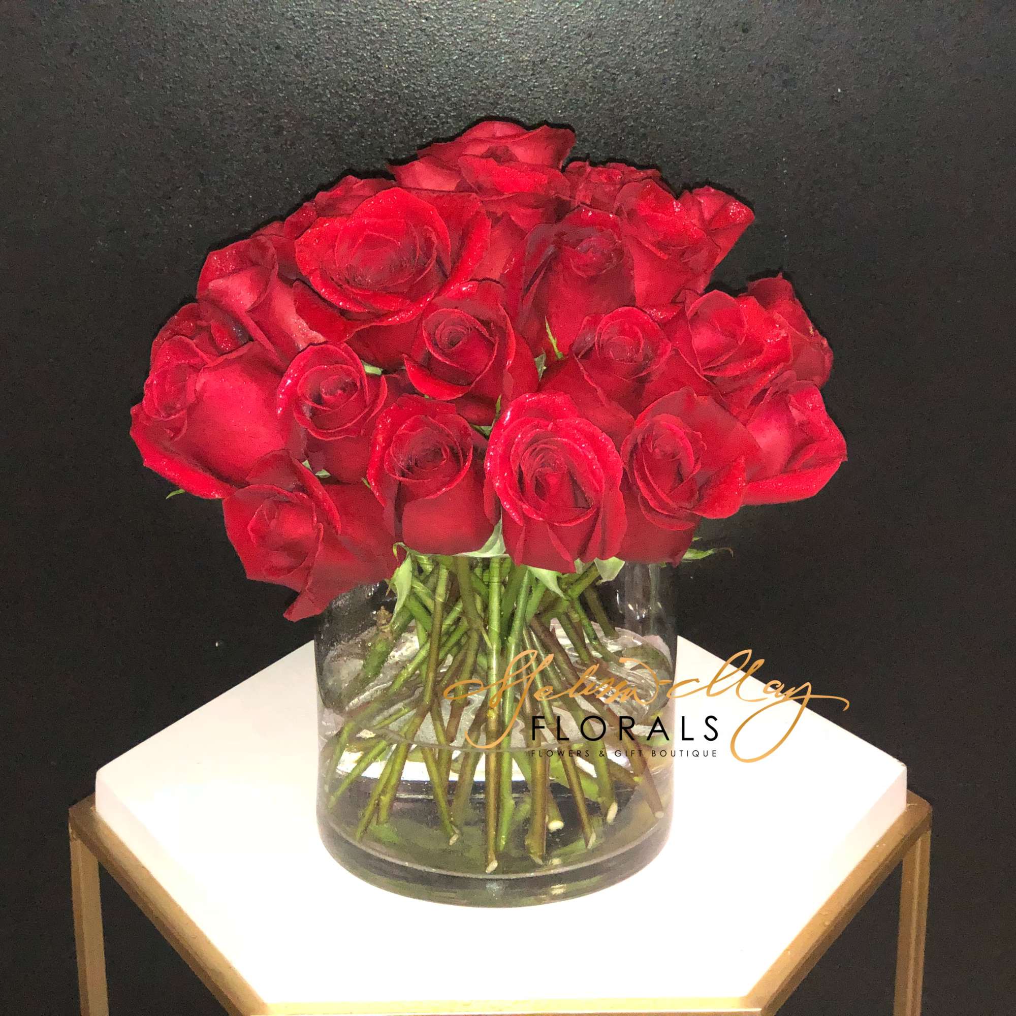 Make a bold statement with this beautifully simple design. Three Dozen Red
