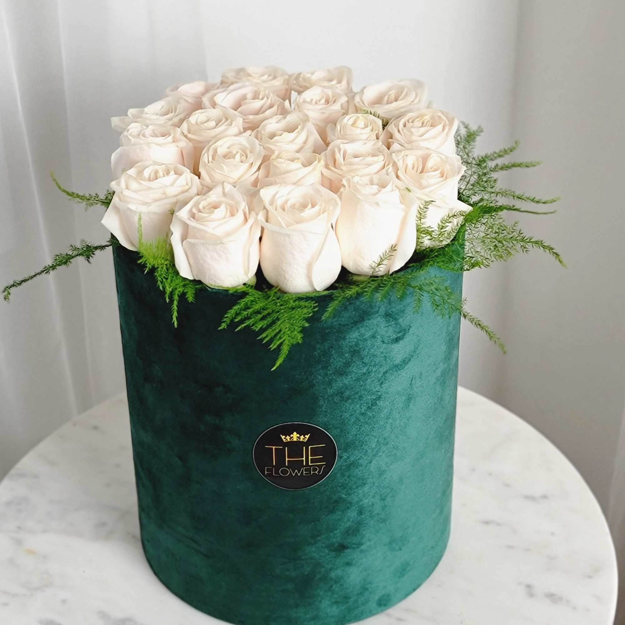 Our luxury box of white roses is a win-win option as all