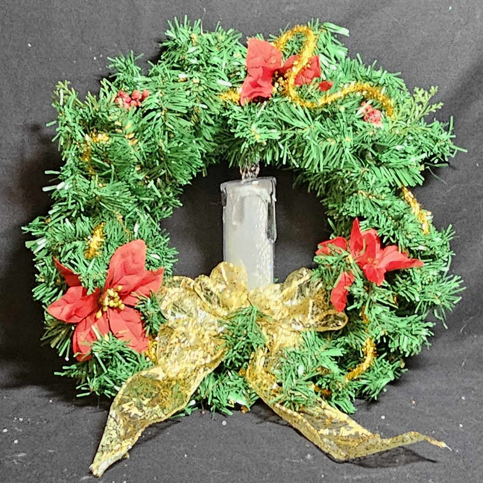 Christmas lightup night wreathes with artificial candles to highlight the holiday season.