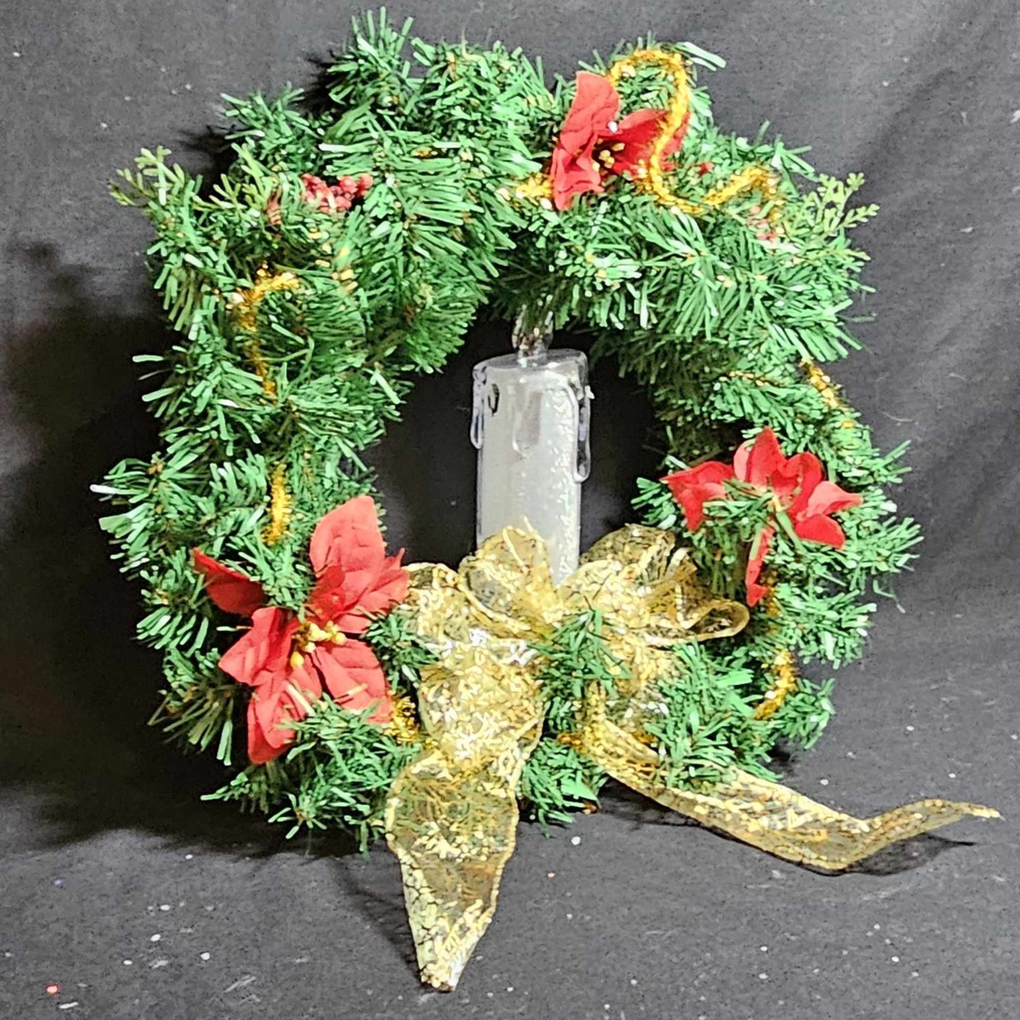 Christmas lightup night wreathes with artificial candles to highlight the holiday season.