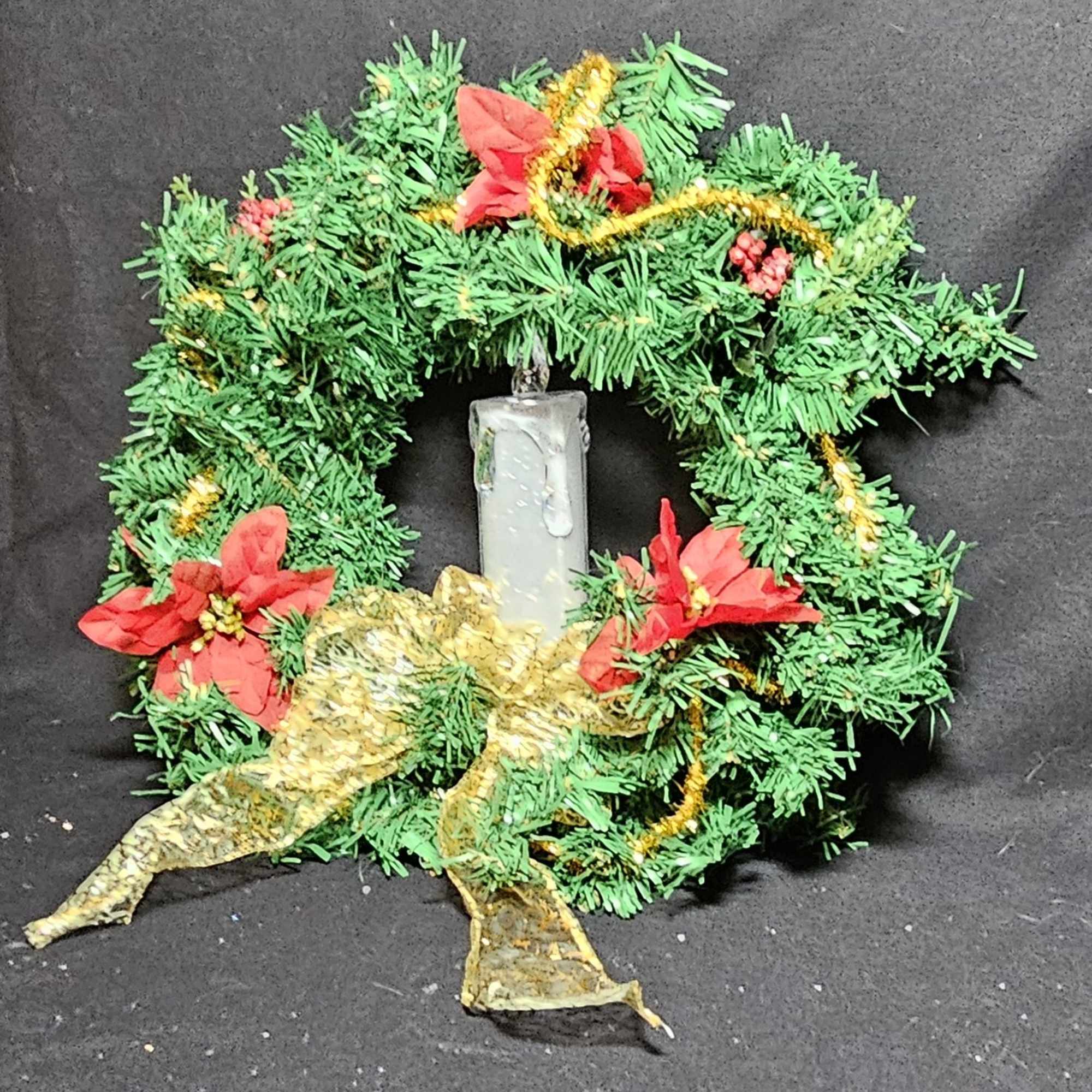 Christmas lightup night wreathes with artificial candles to highlight the holiday season.