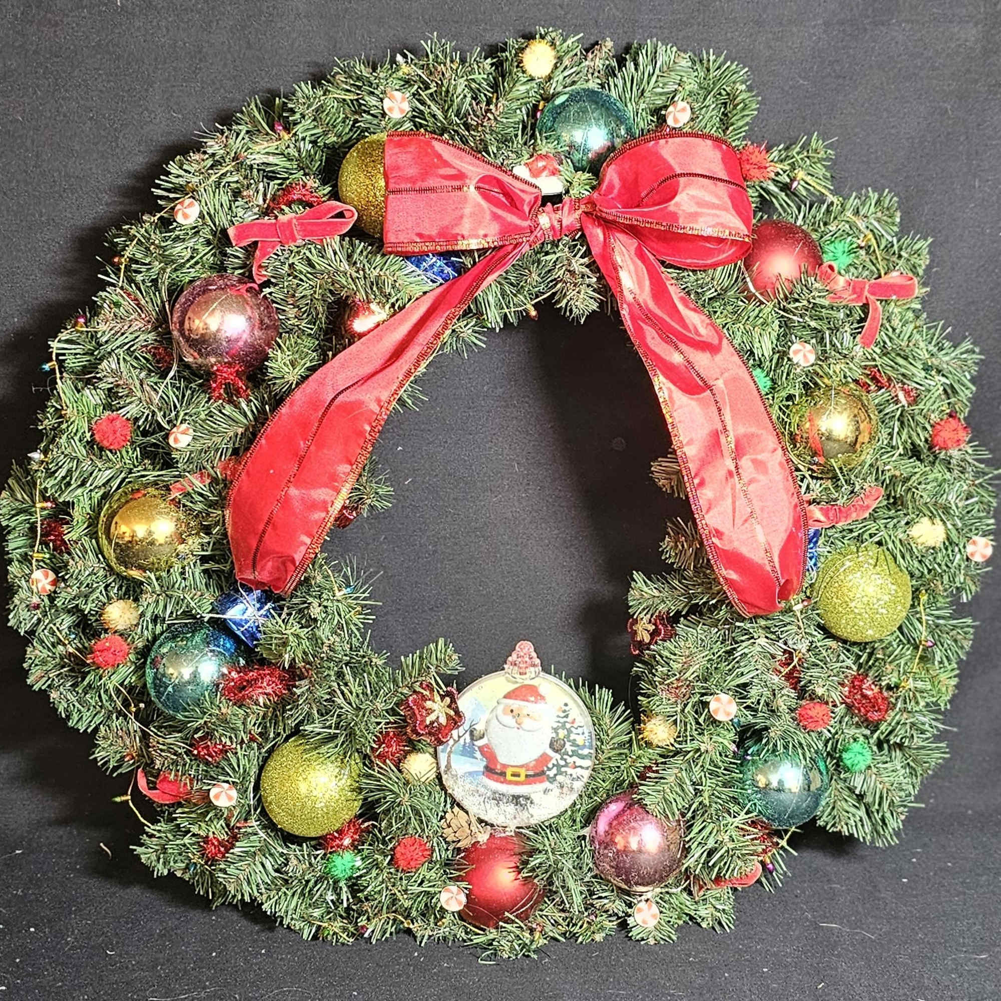 Santa wreath with bow and decorations