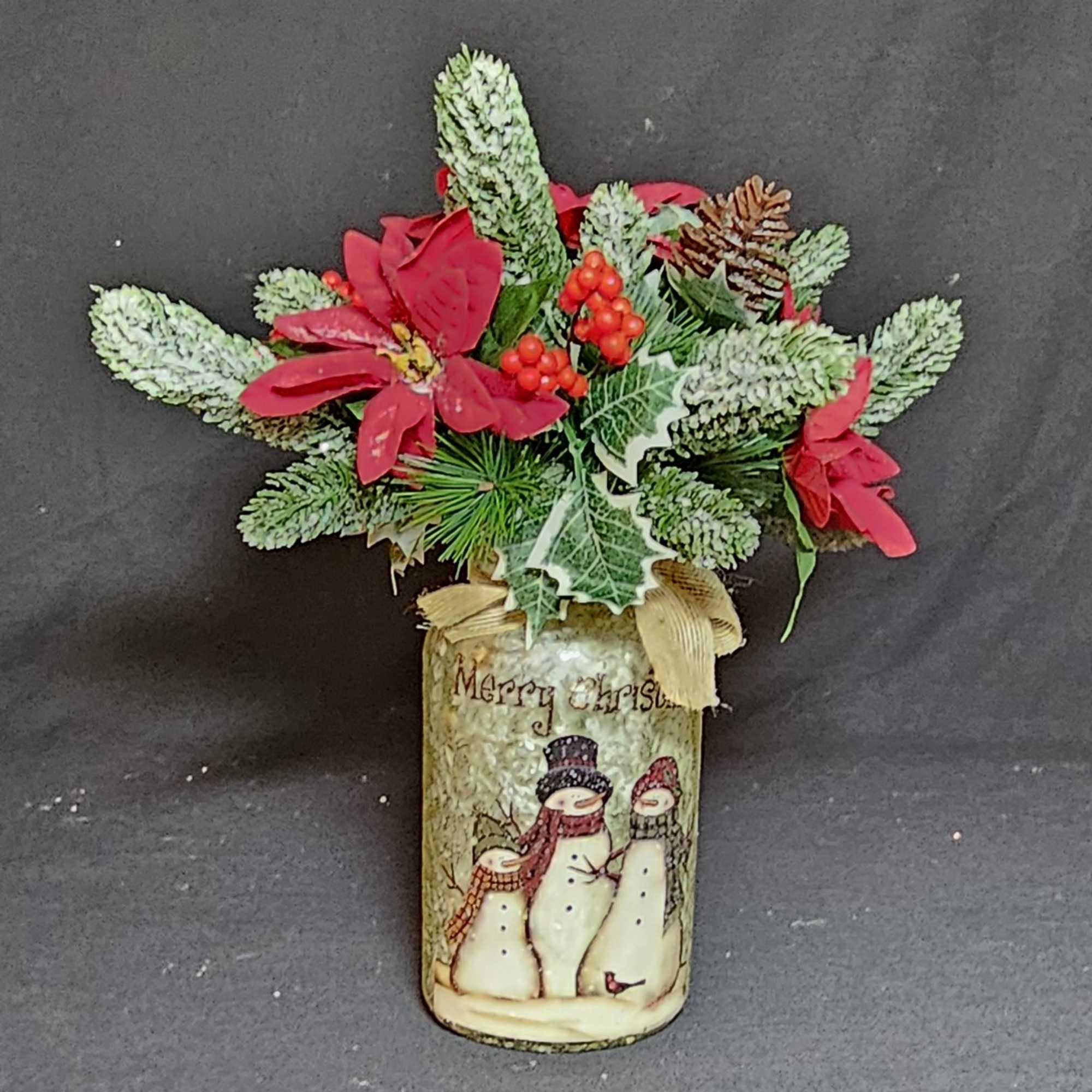 Artificial Poinsettia in glass Merry Christmas vase