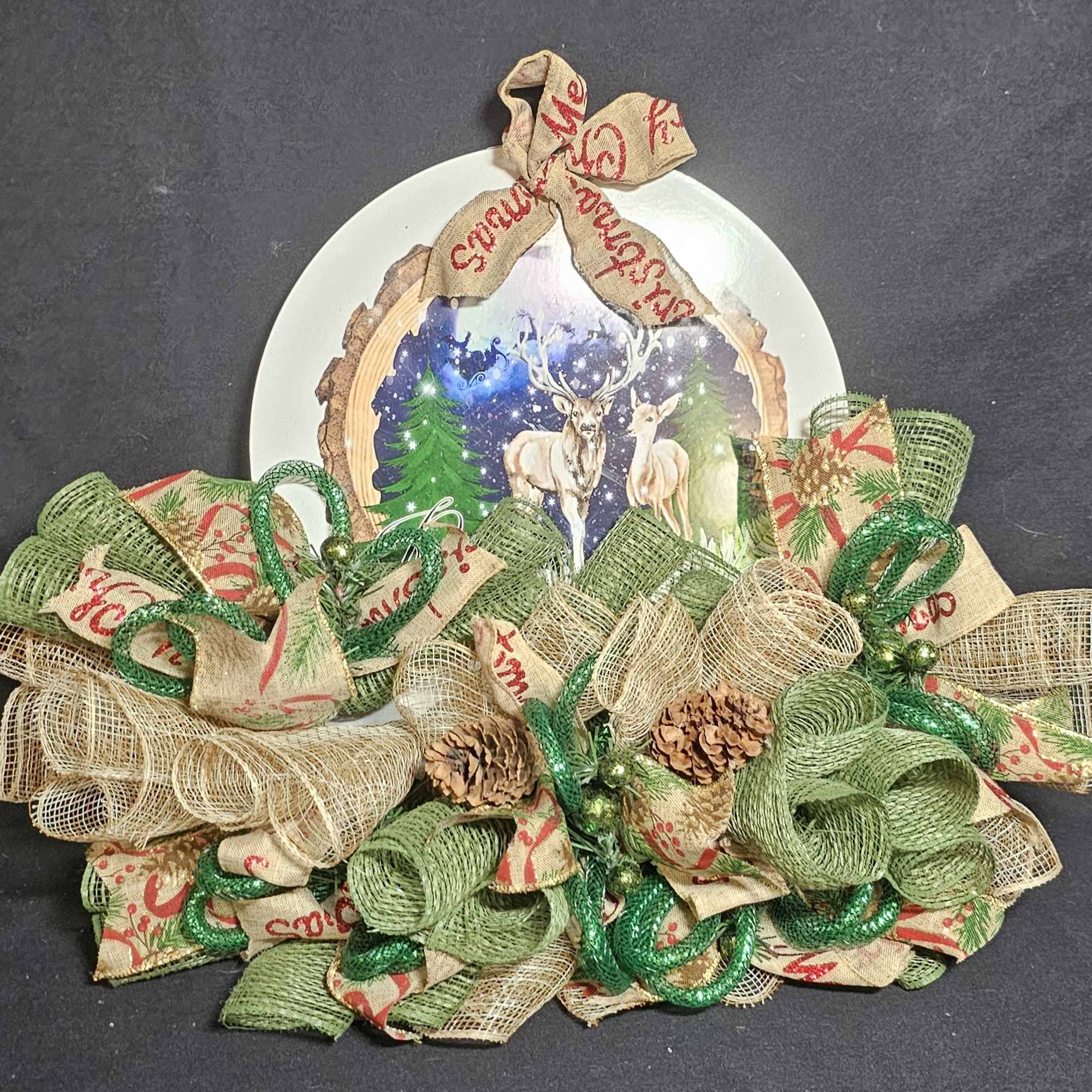 Christmas plate with snowy reindeer and celestial background