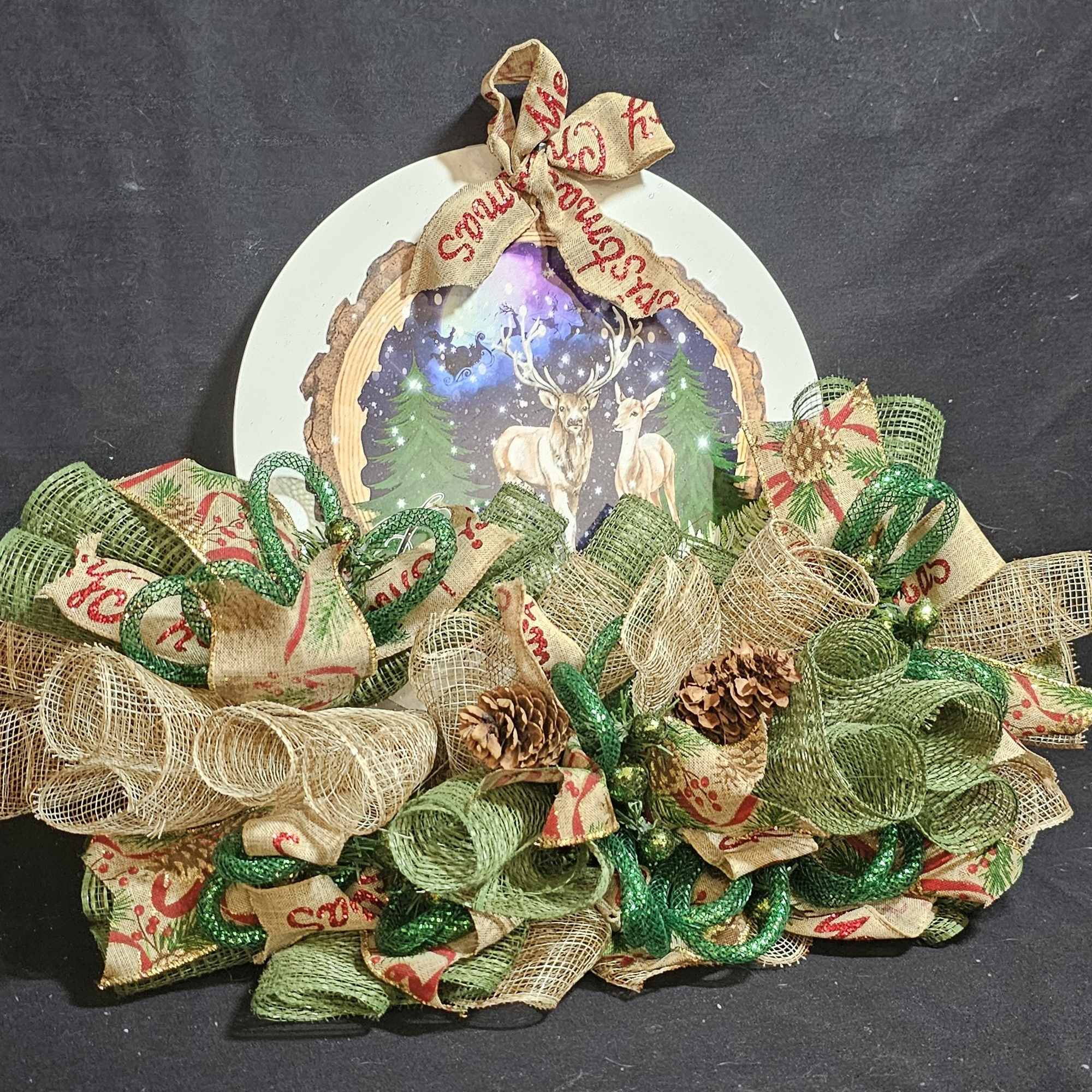 Christmas plate with snowy reindeer and celestial background