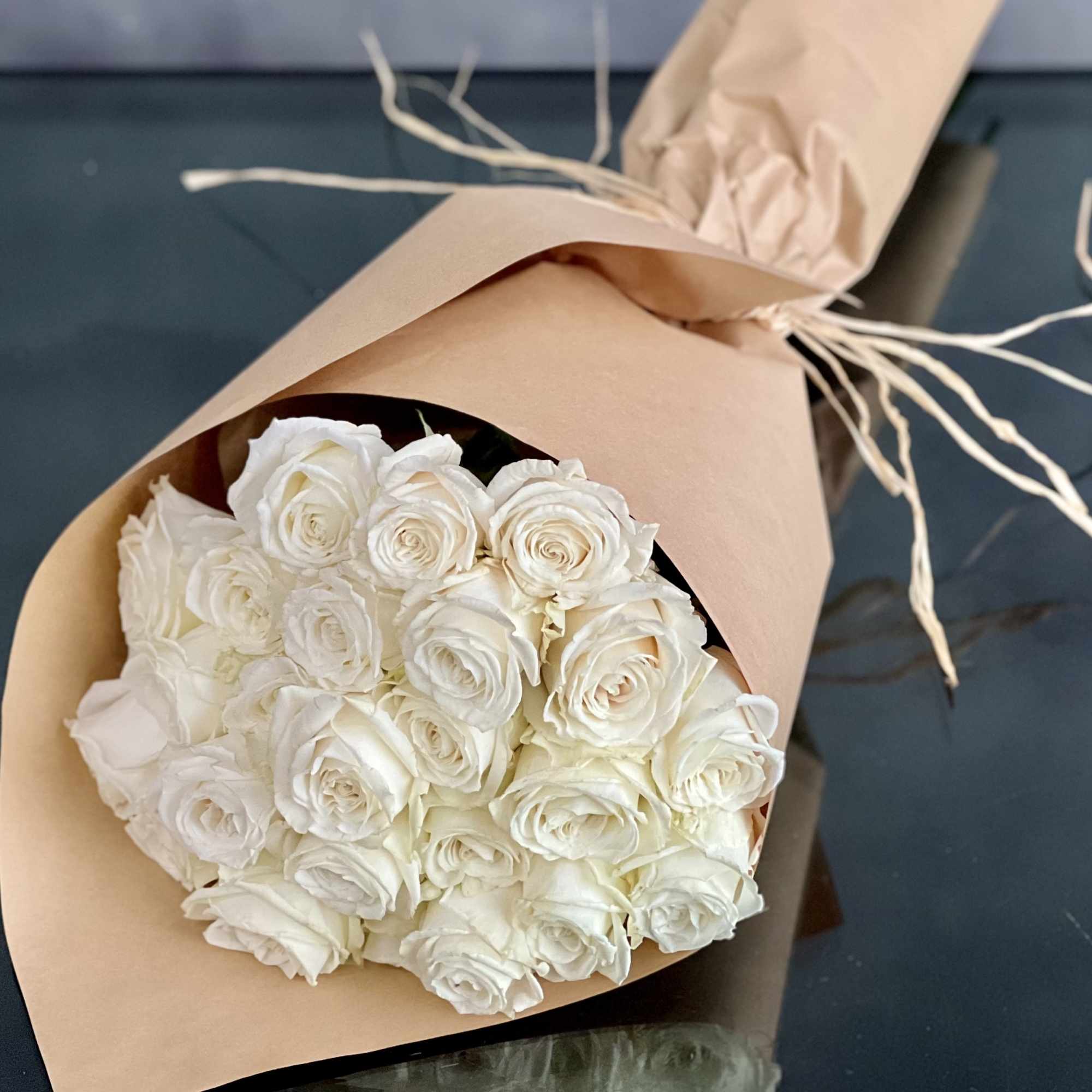 Certainly! A bouquet of 24 red roses is a classic and romantic