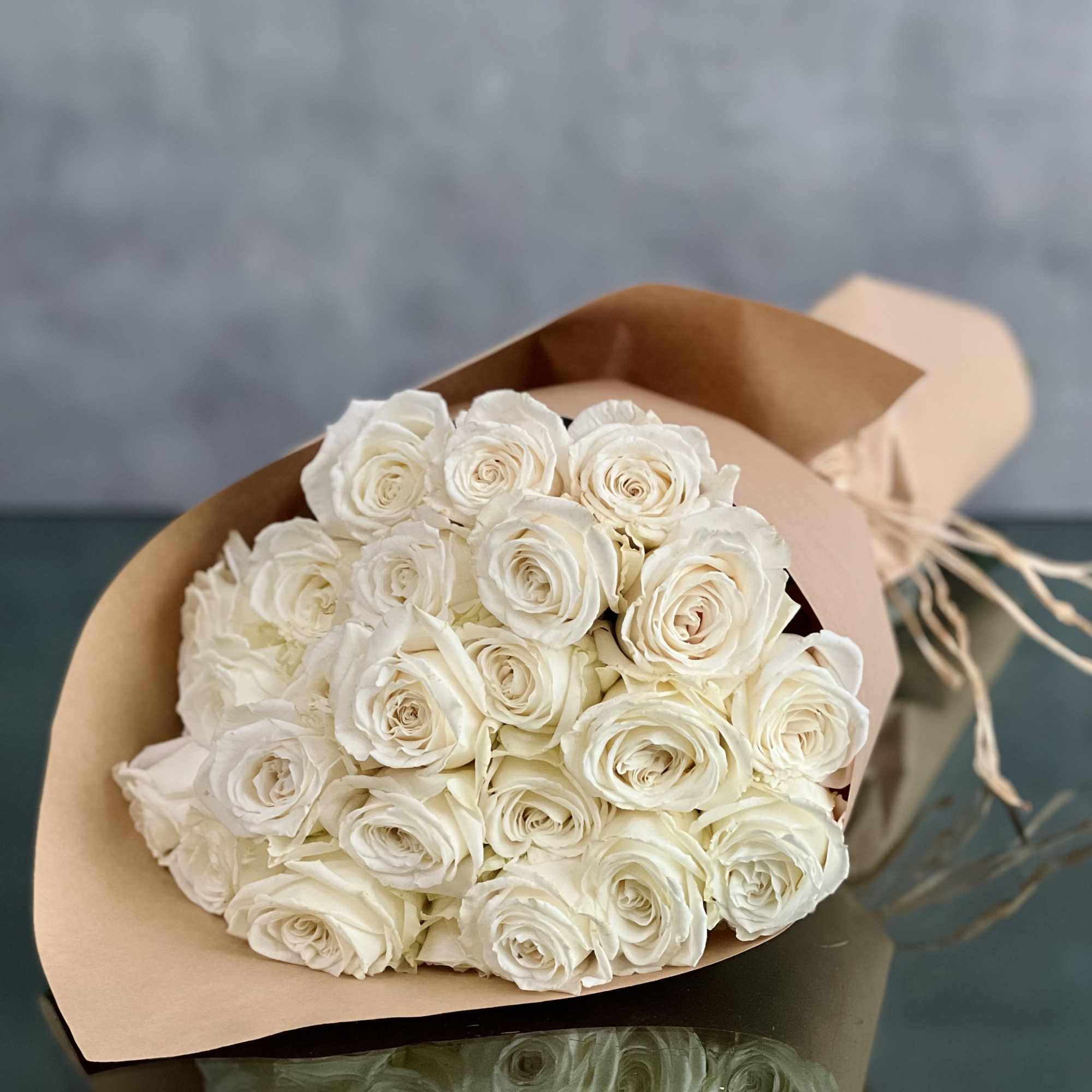 Certainly! A bouquet of 24 red roses is a classic and romantic