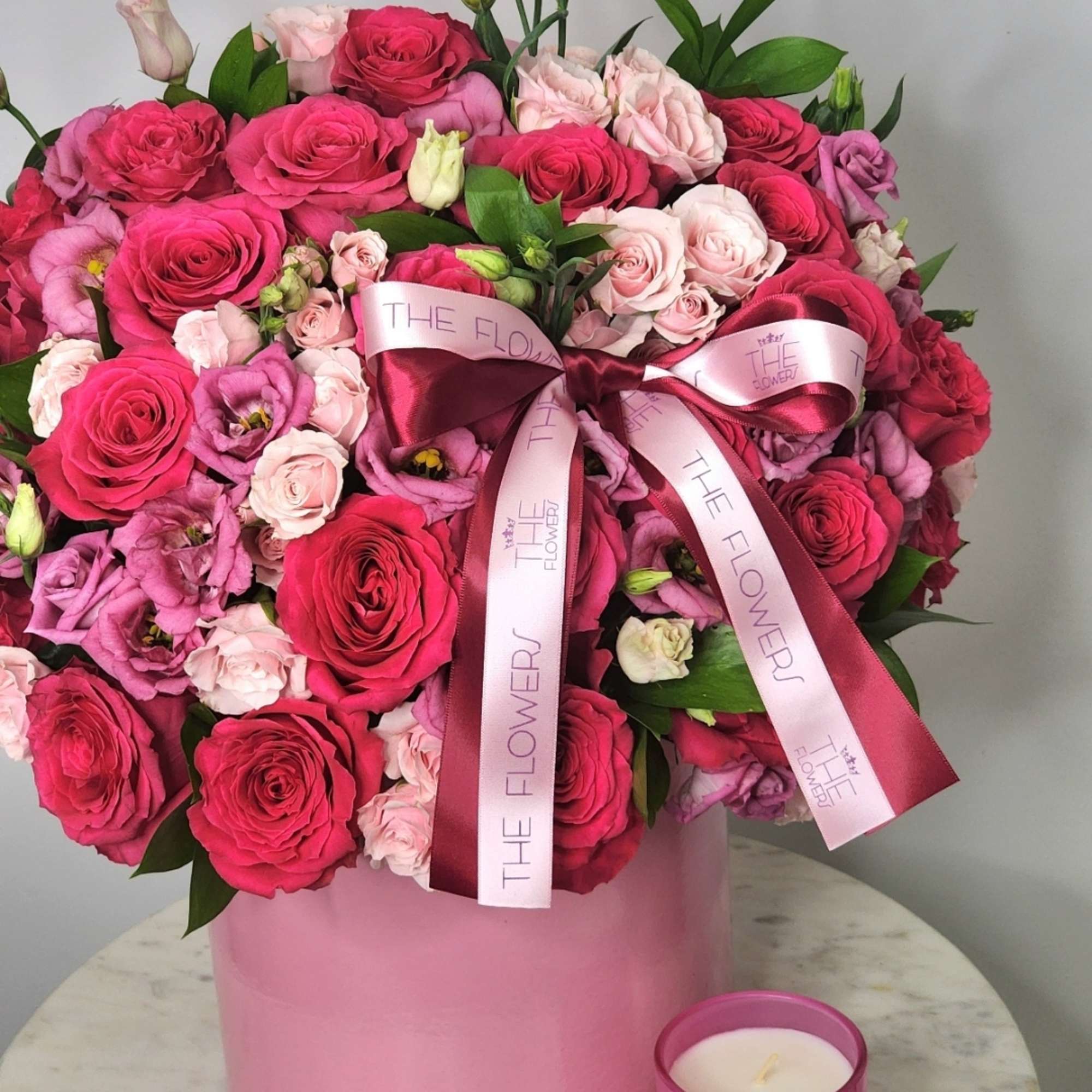 Soft pink combined with hot pink roses is one of our bestsellers.