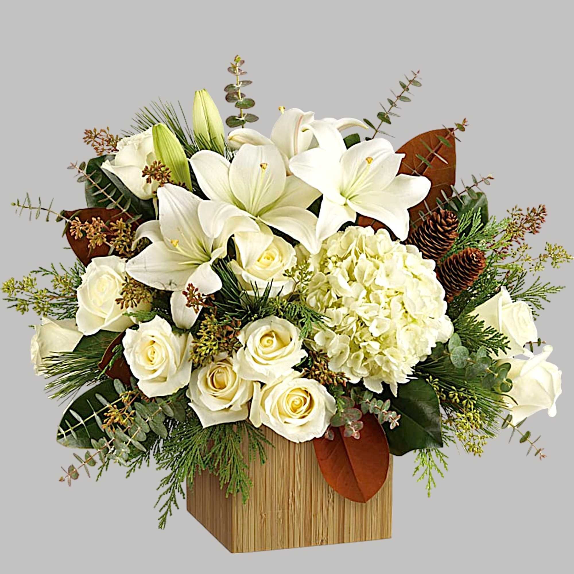 Give the gift of modern winter-white style with this breathtaking arrangement, hand-arranged