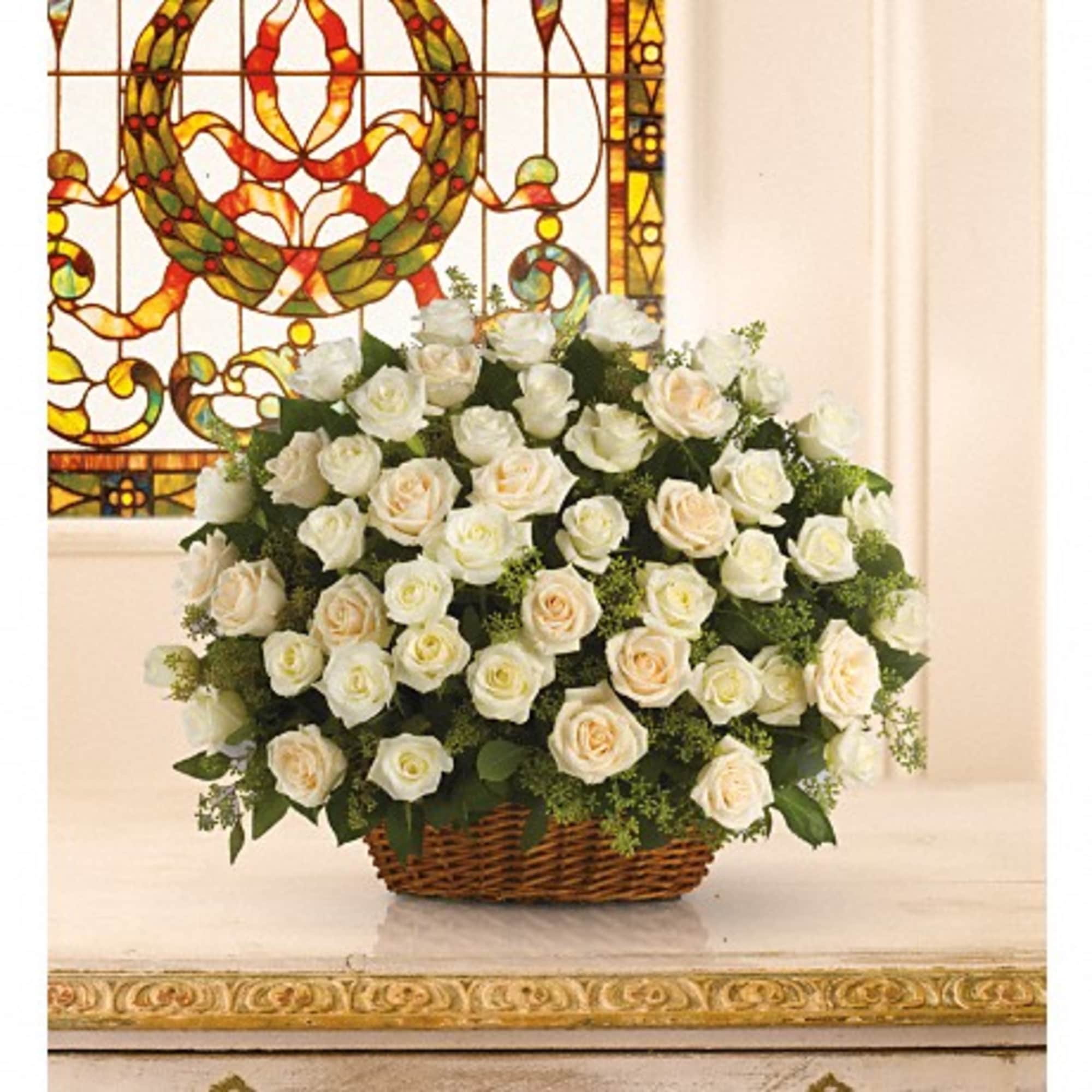 A beautiful, bountiful basket of luminous white roses that feels so fresh