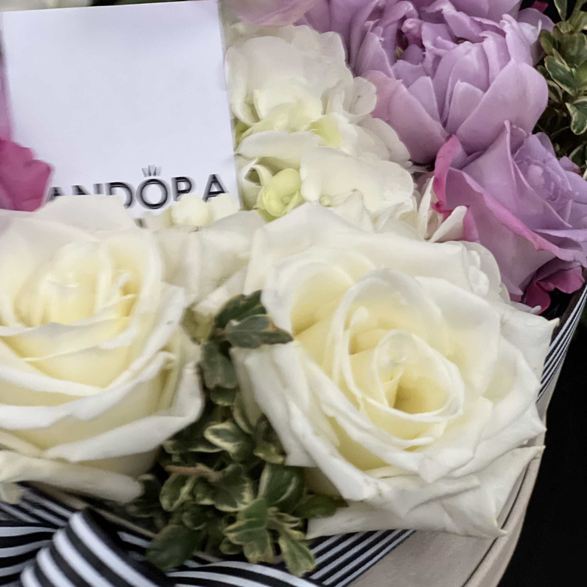 You may add gift box in flower box, surprise her how much