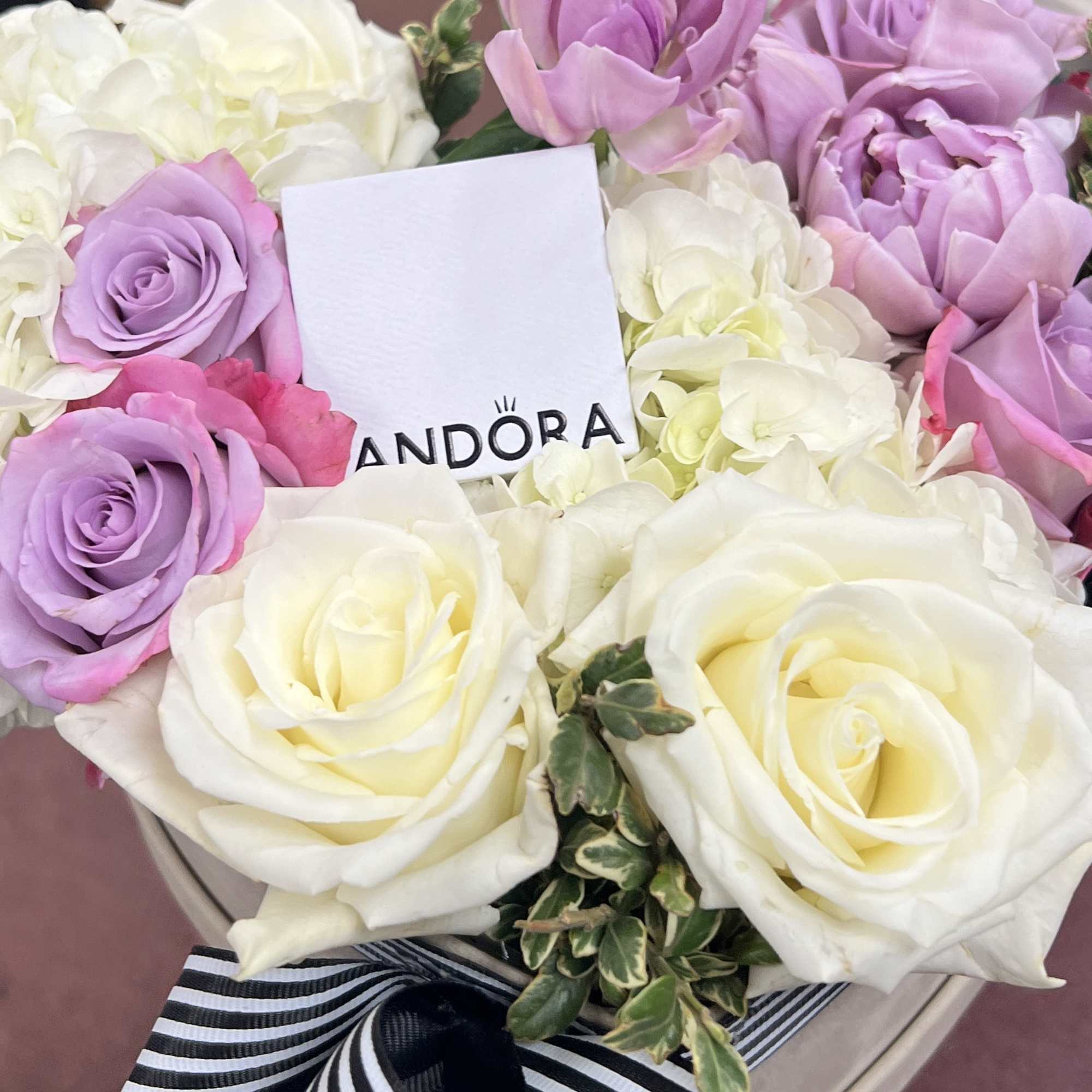 You may add gift box in flower box, surprise her how much