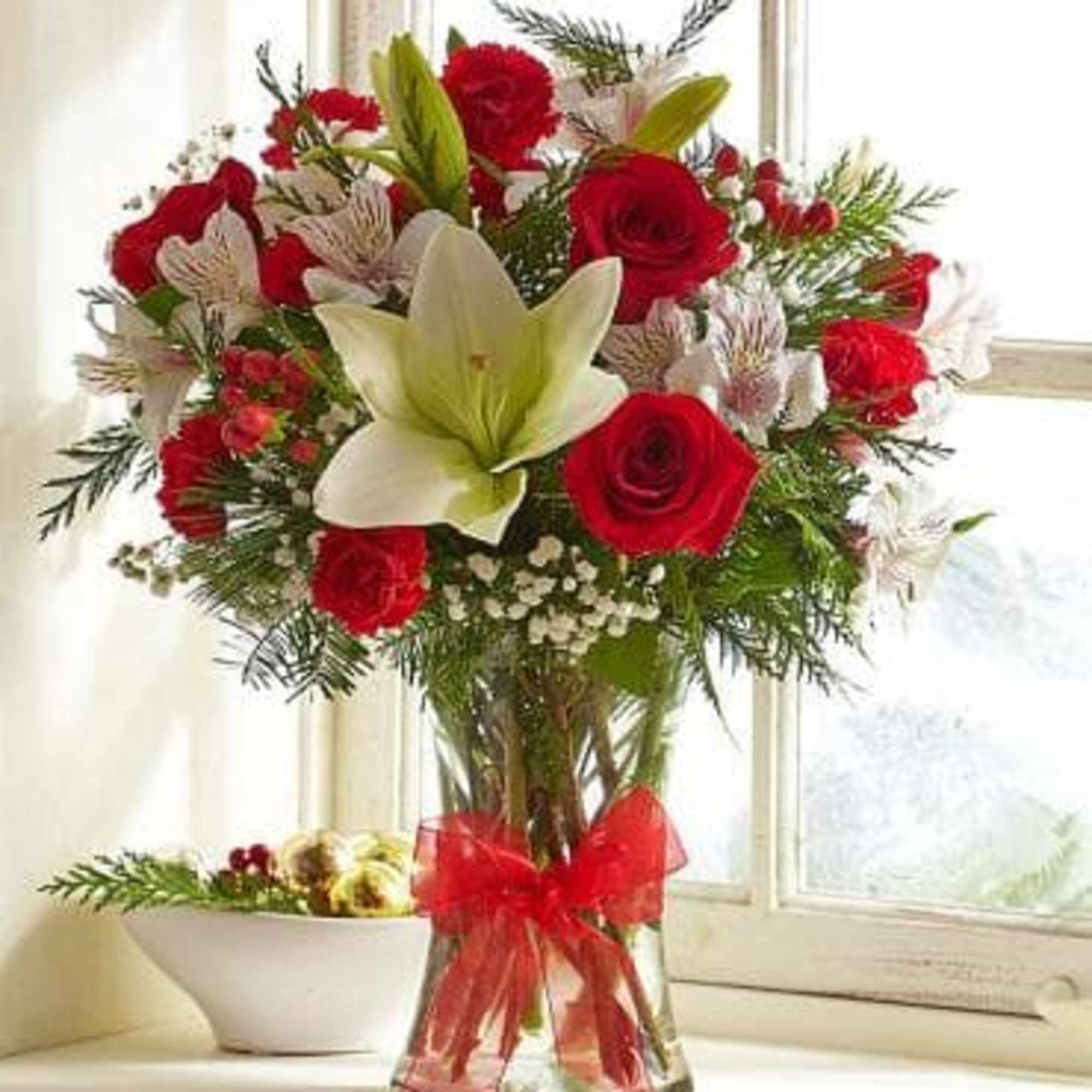 We've decked out our bestselling, truly original bouquet in its holiday best. 
We've decked out our bestselling, truly original bouquet in its holiday best.